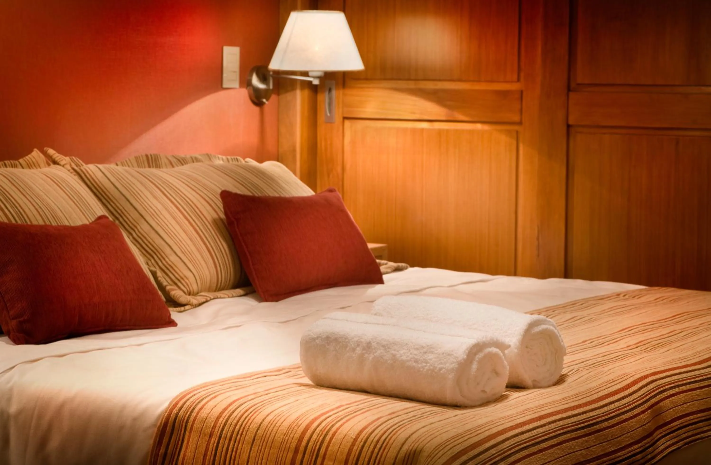 Bed in Hostería Antares Patagonia by Visionnaire