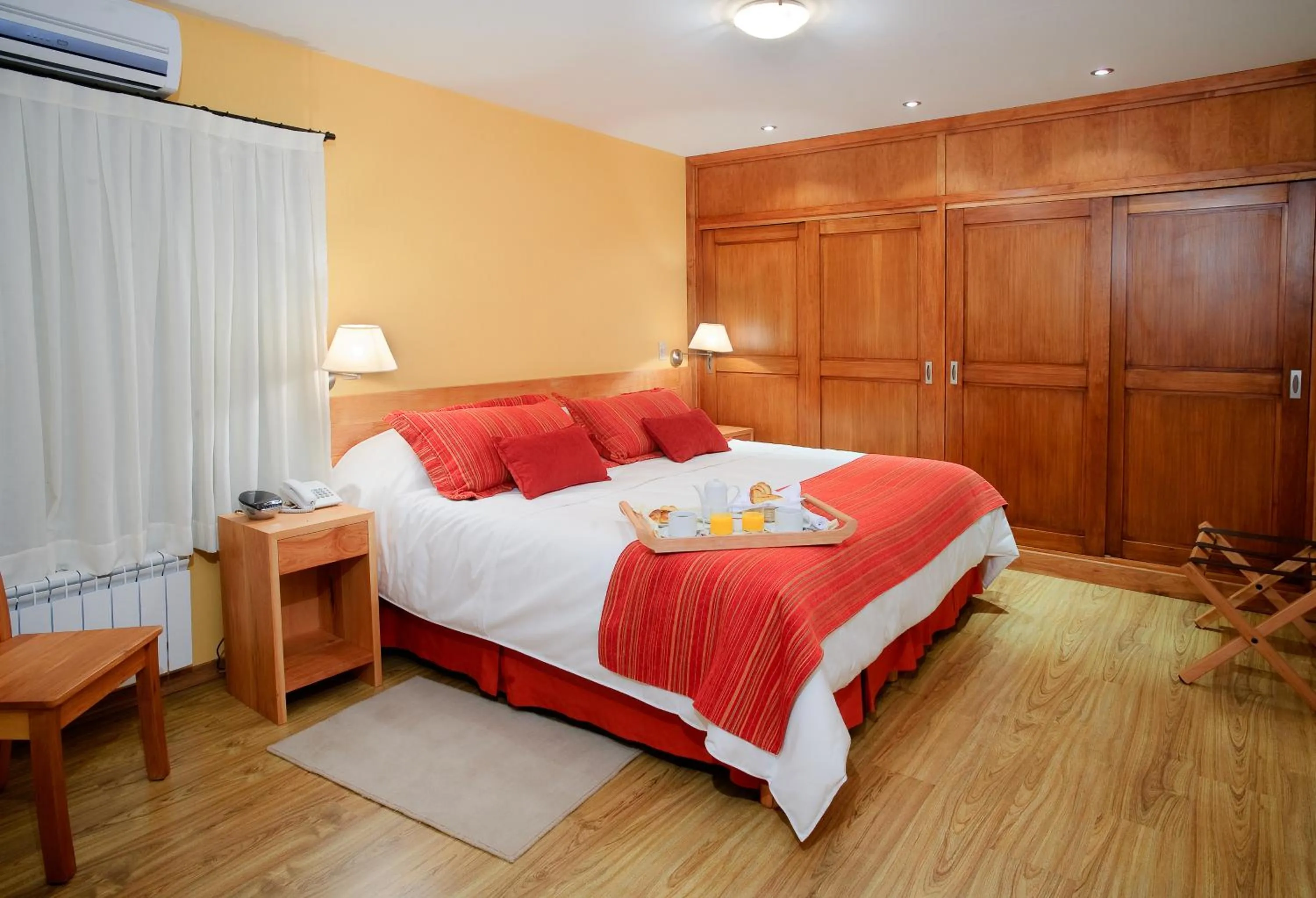 Bed in Hostería Antares Patagonia by Visionnaire