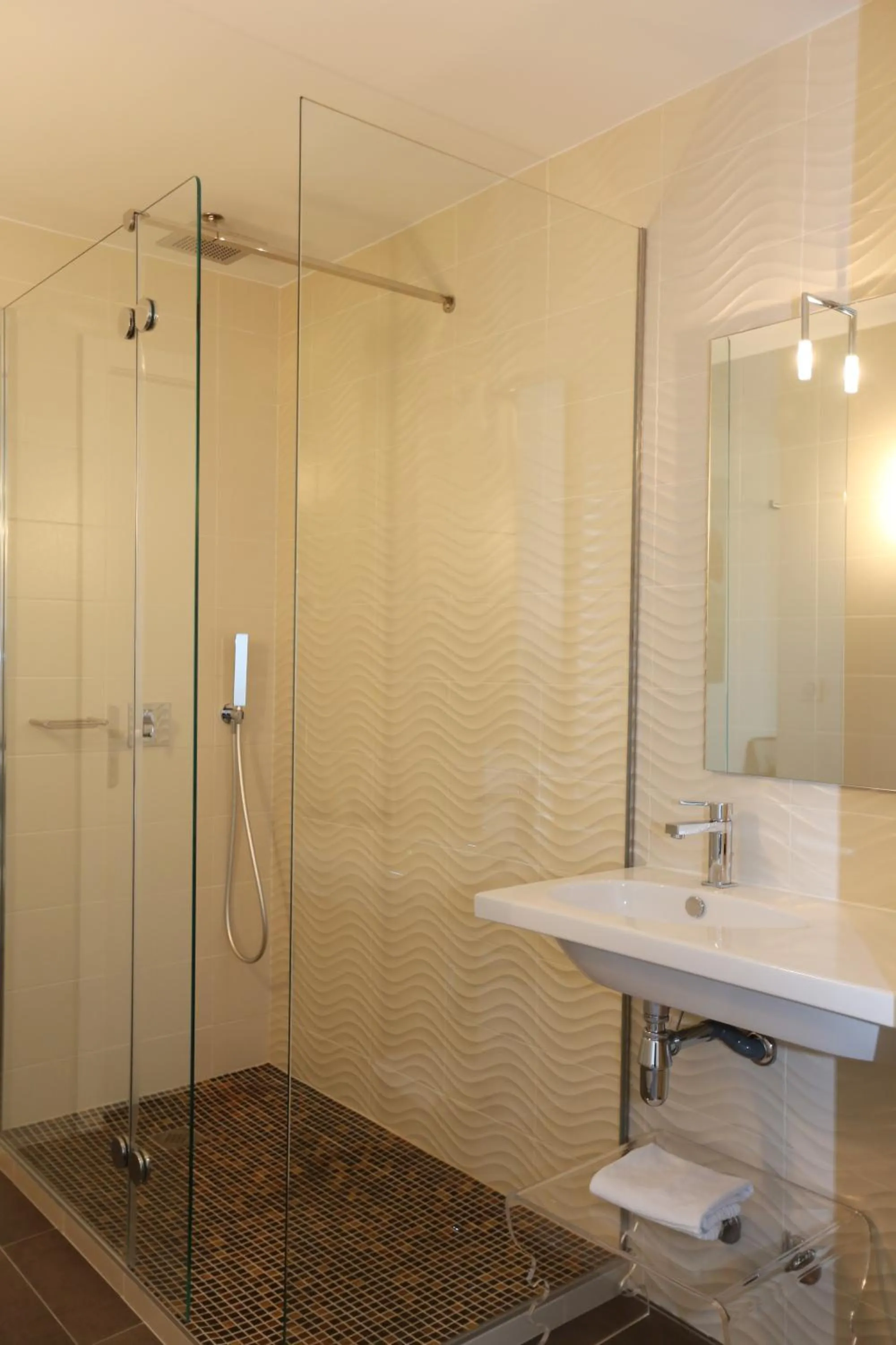 Shower in Les Criquets Hôtel & Spa