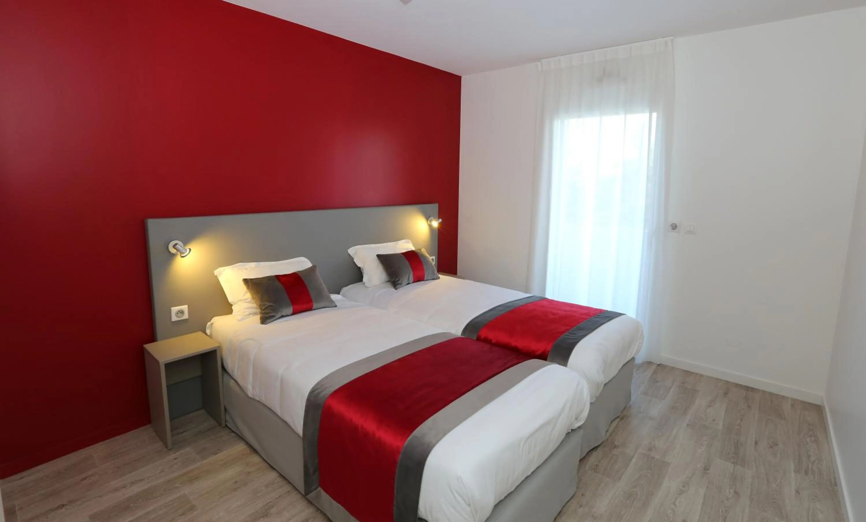 Bed in Les Criquets Hôtel & Spa