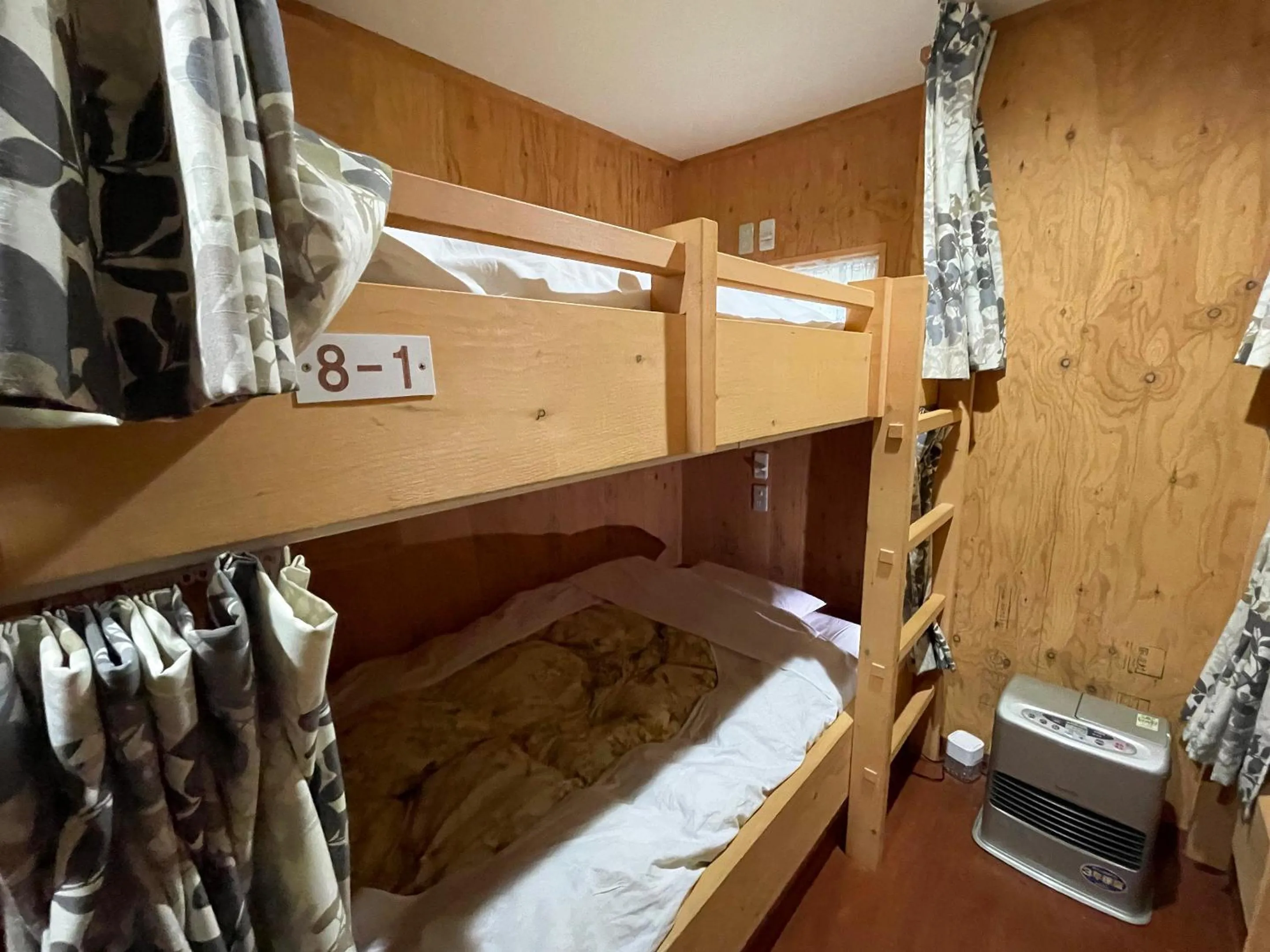 Bedroom, Bed in Guesthouse Otaru Wanokaze