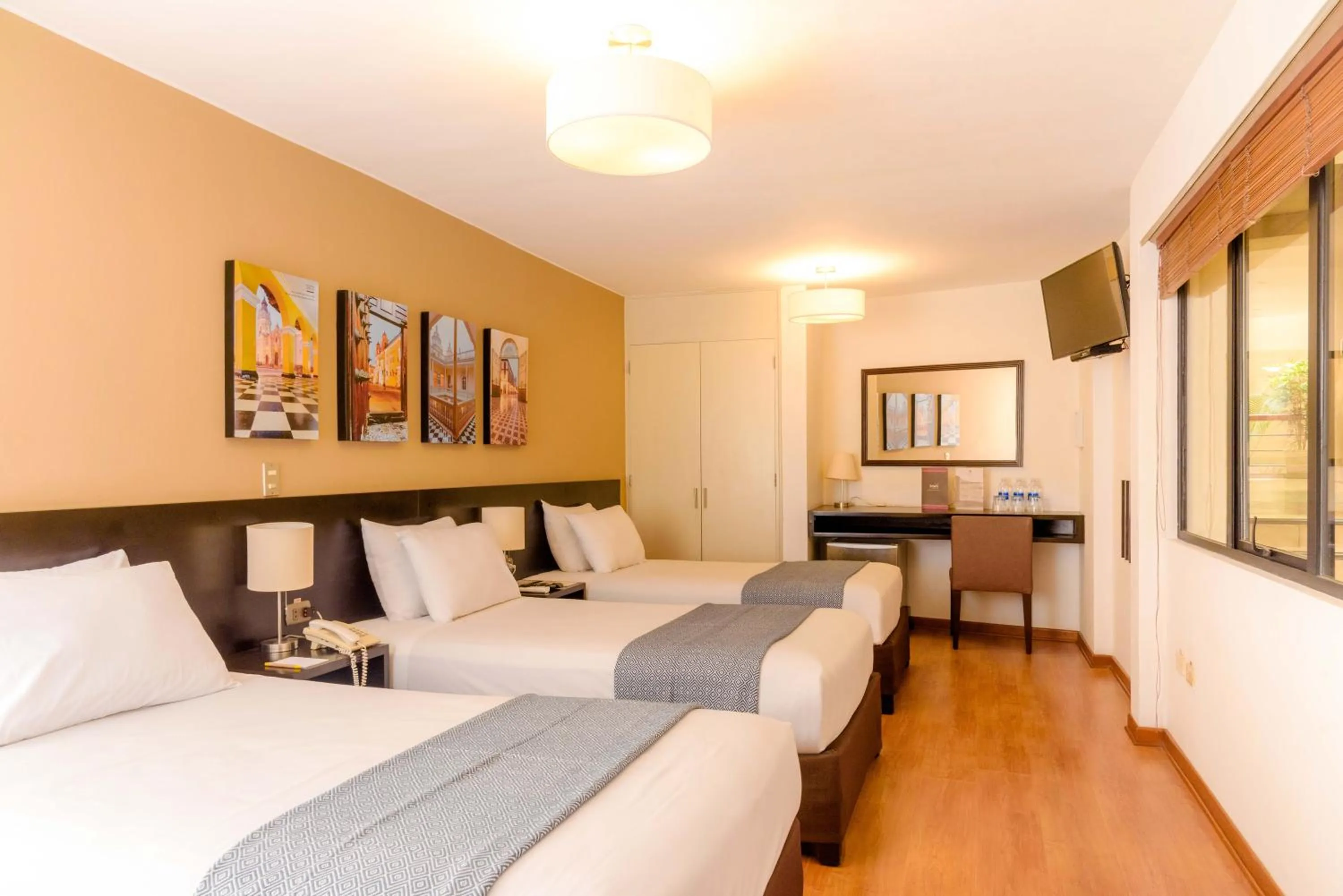 Bed in Girasoles Hotel