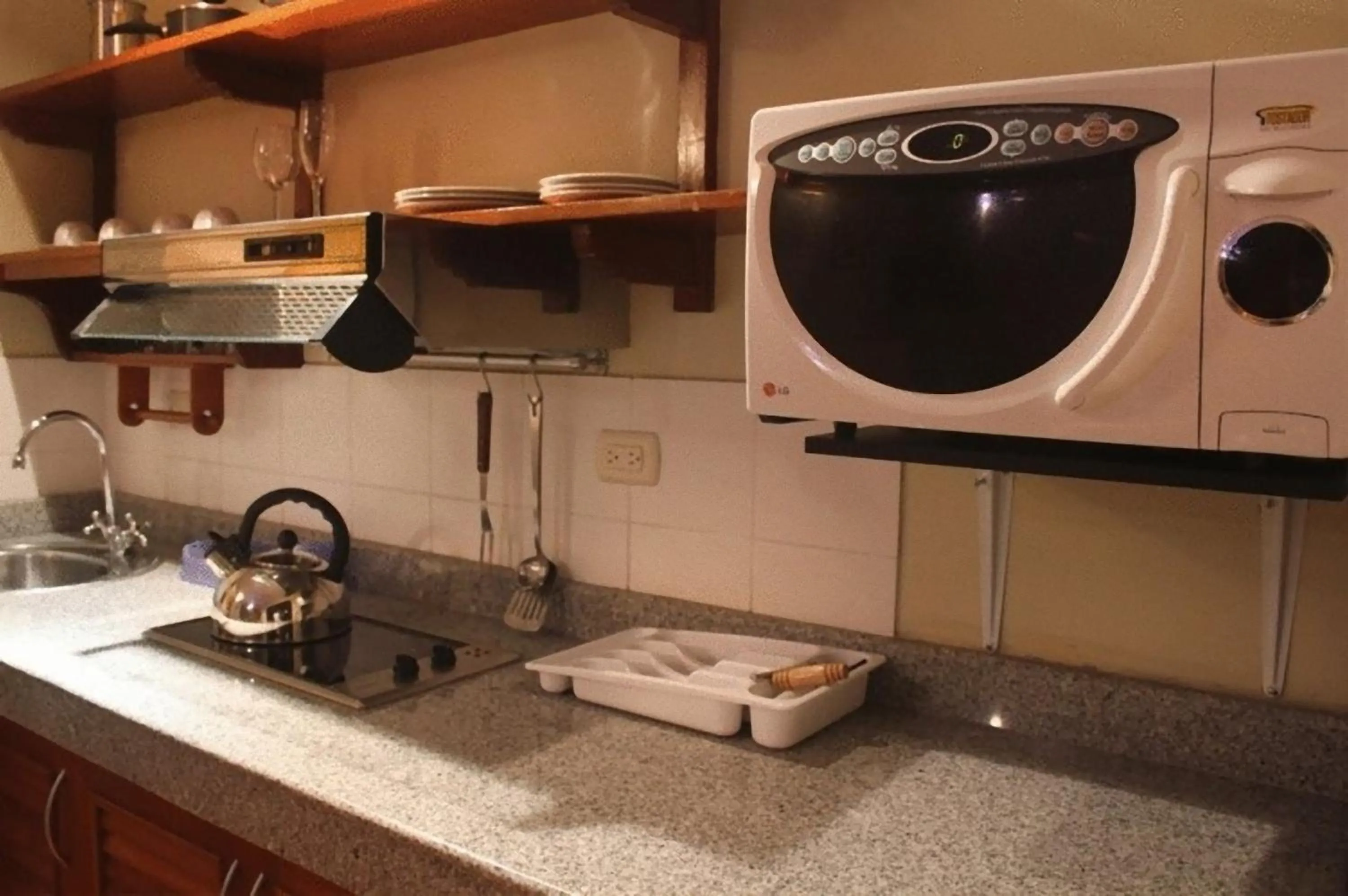 Kitchen or kitchenette in Peru Star Apart-Hotel