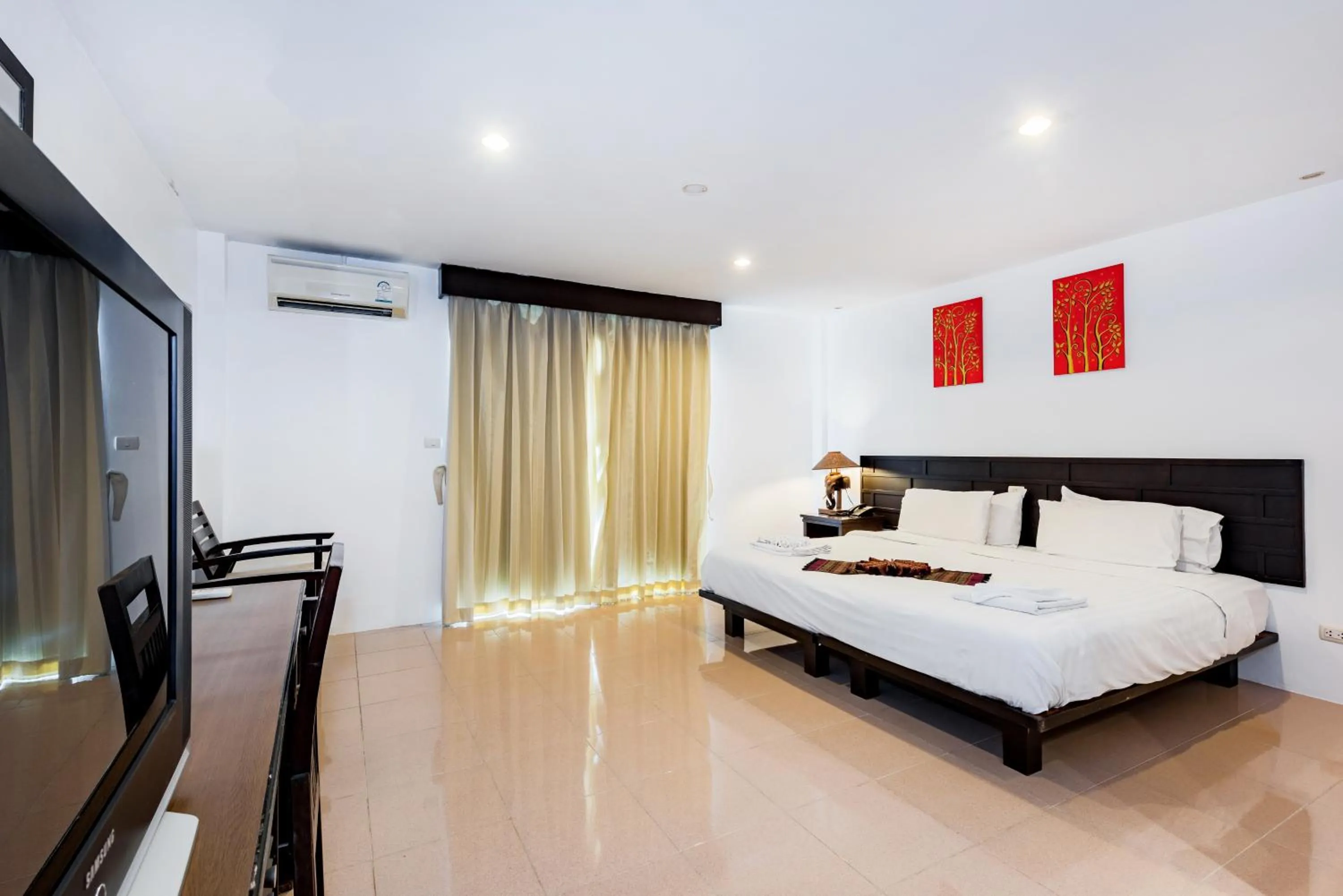 TV and multimedia in My Hotel Phuket (SHA Extra Plus)