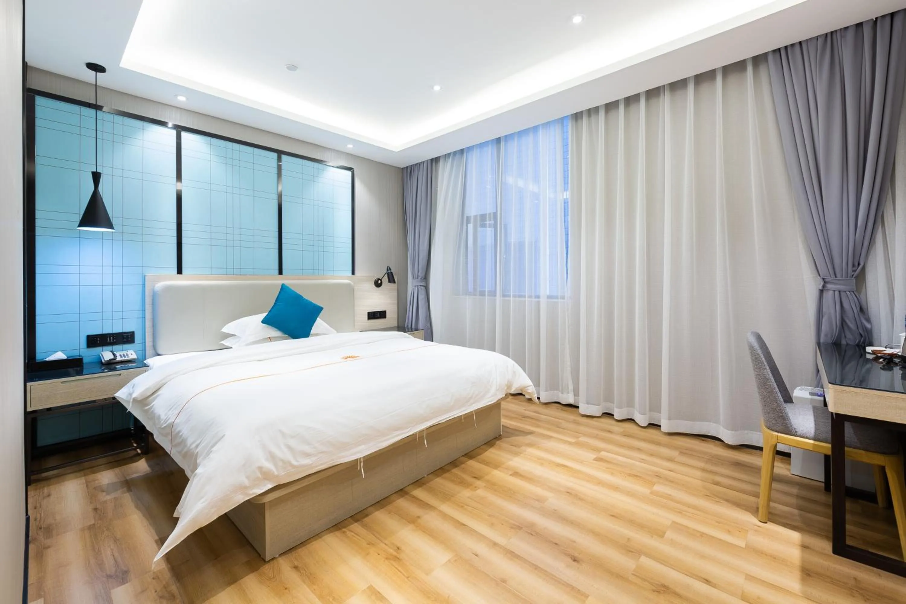 Bed in 朗逸商务酒店 Warm Yes Hotel-广交会期间提供免费穿梭巴士