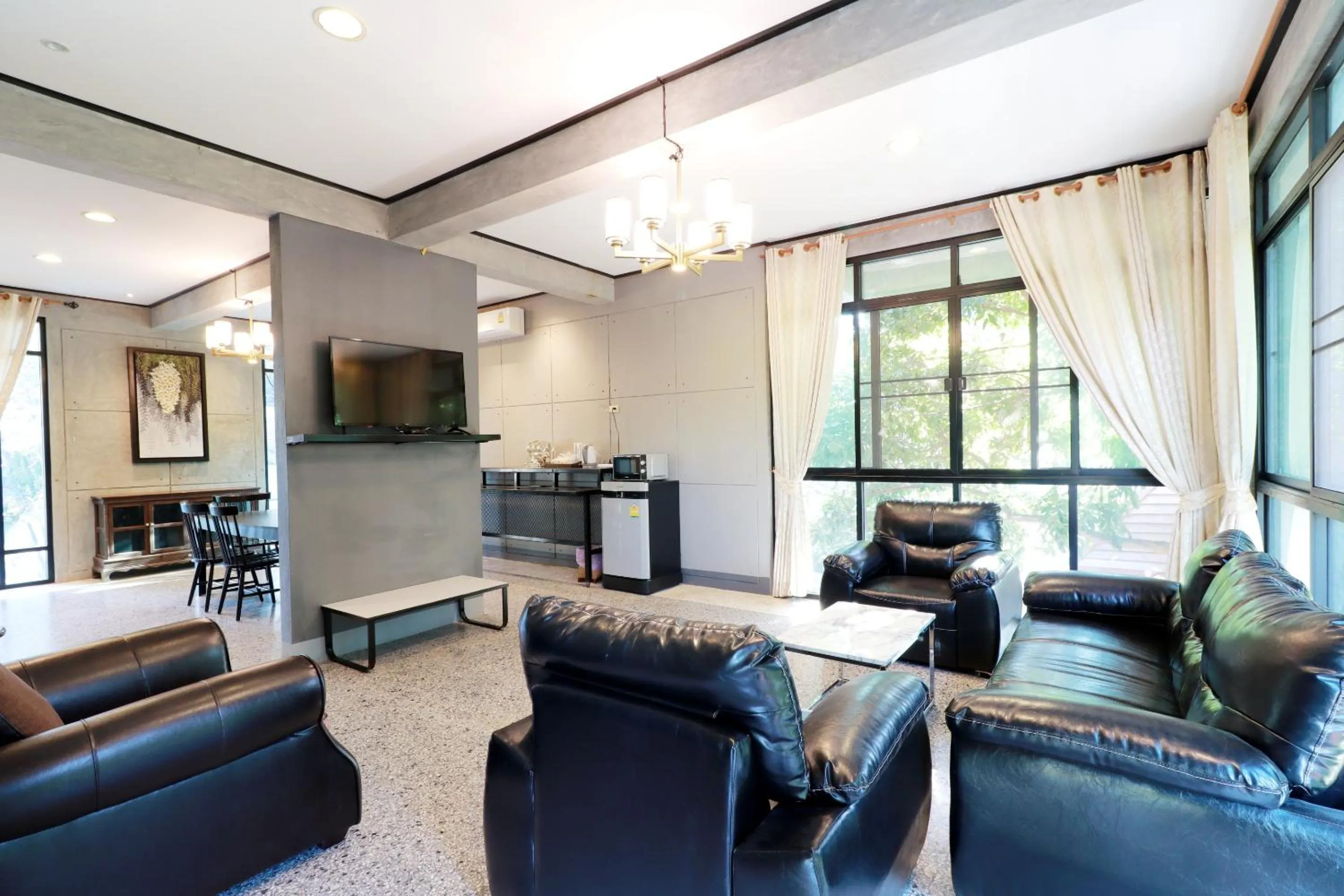 Living room in Capital O 464 At Nata Chiangmai Chic Jungle