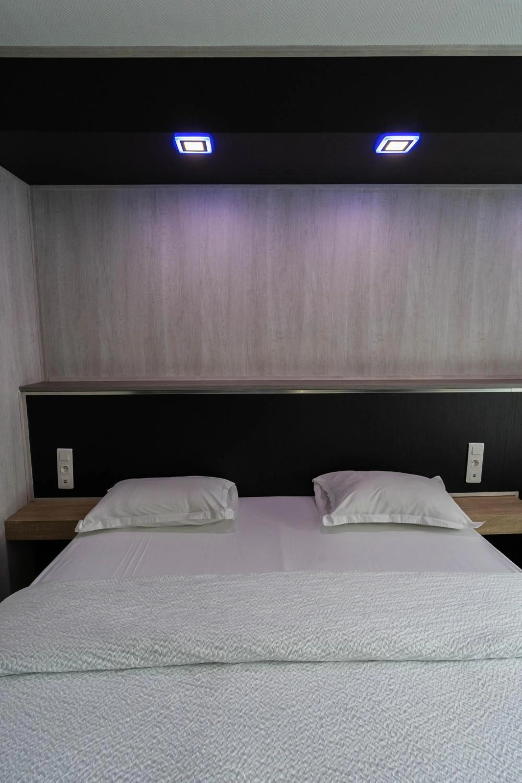 Bed in Hôtel La Rocade