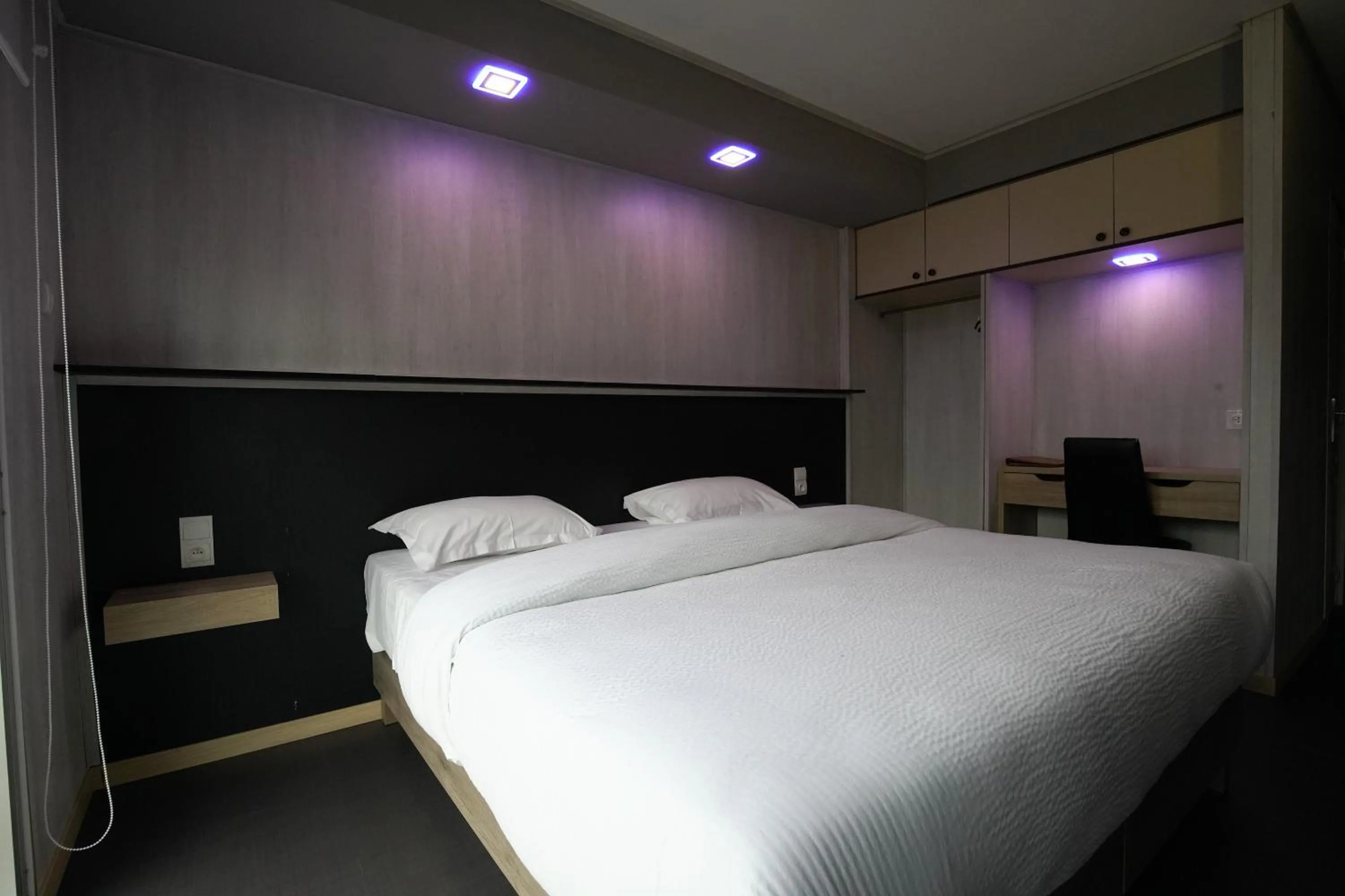 Bed in Hôtel La Rocade