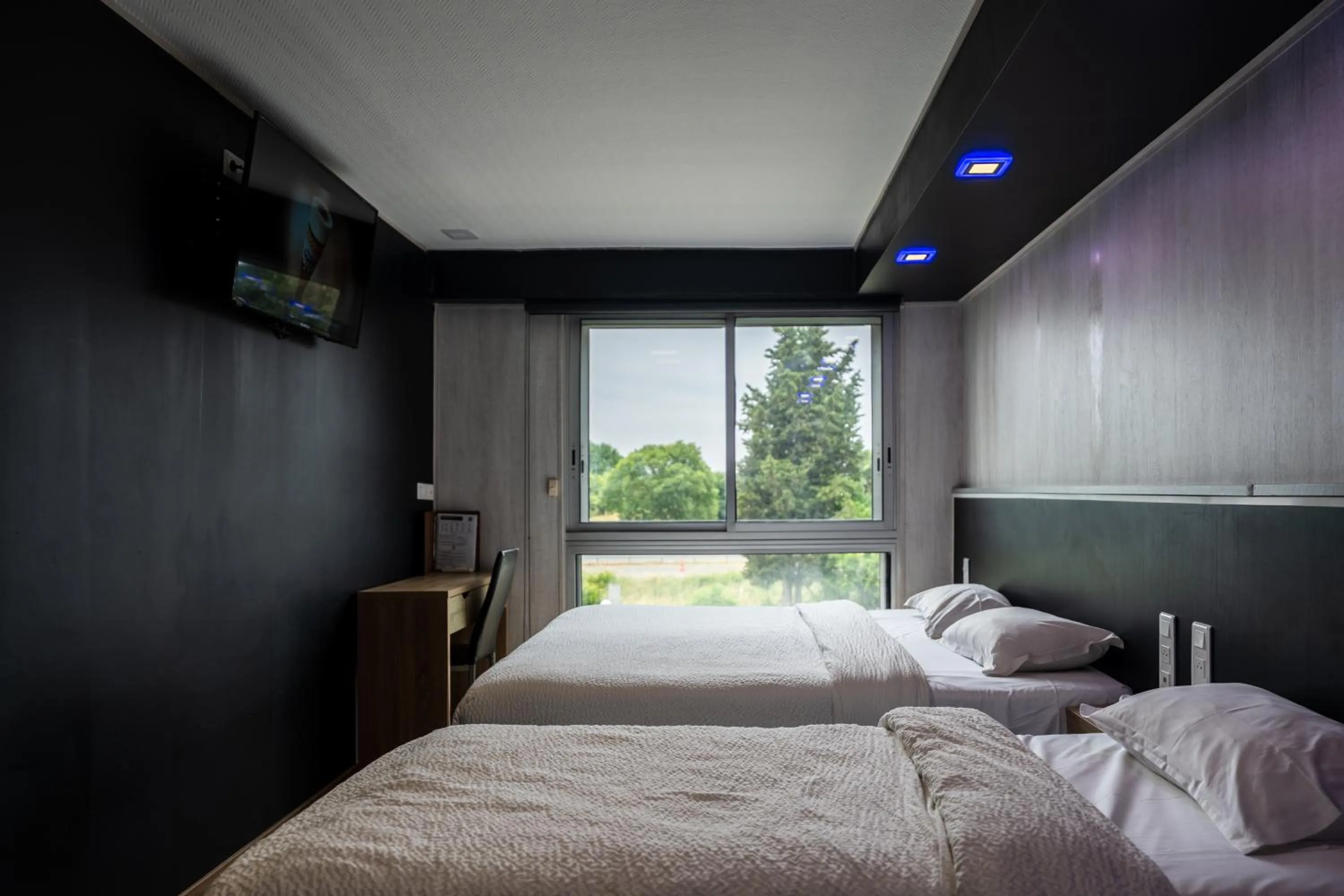 Bed in Hôtel La Rocade