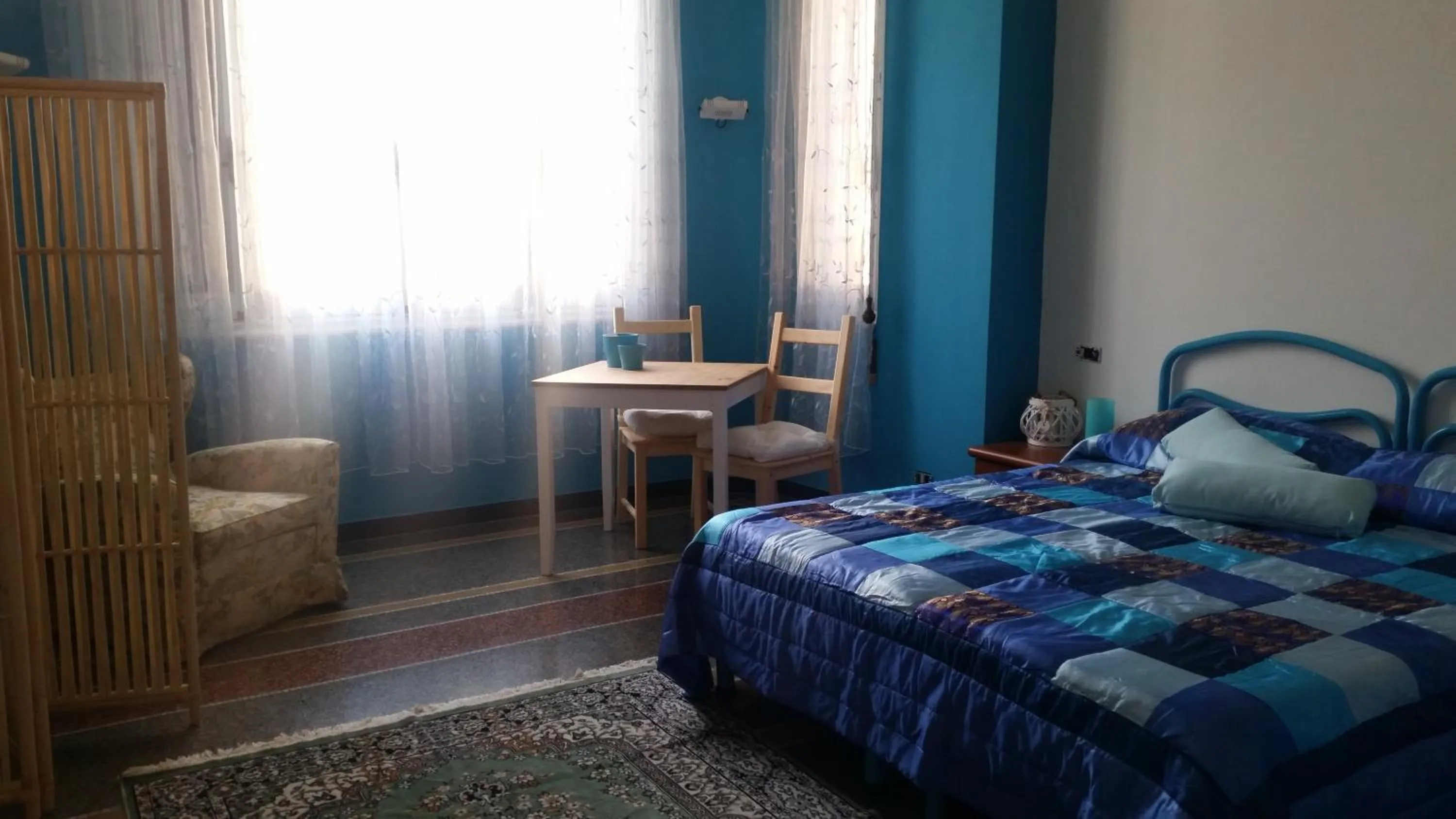 Photo of the whole room, Bed in MyDre@mSavona