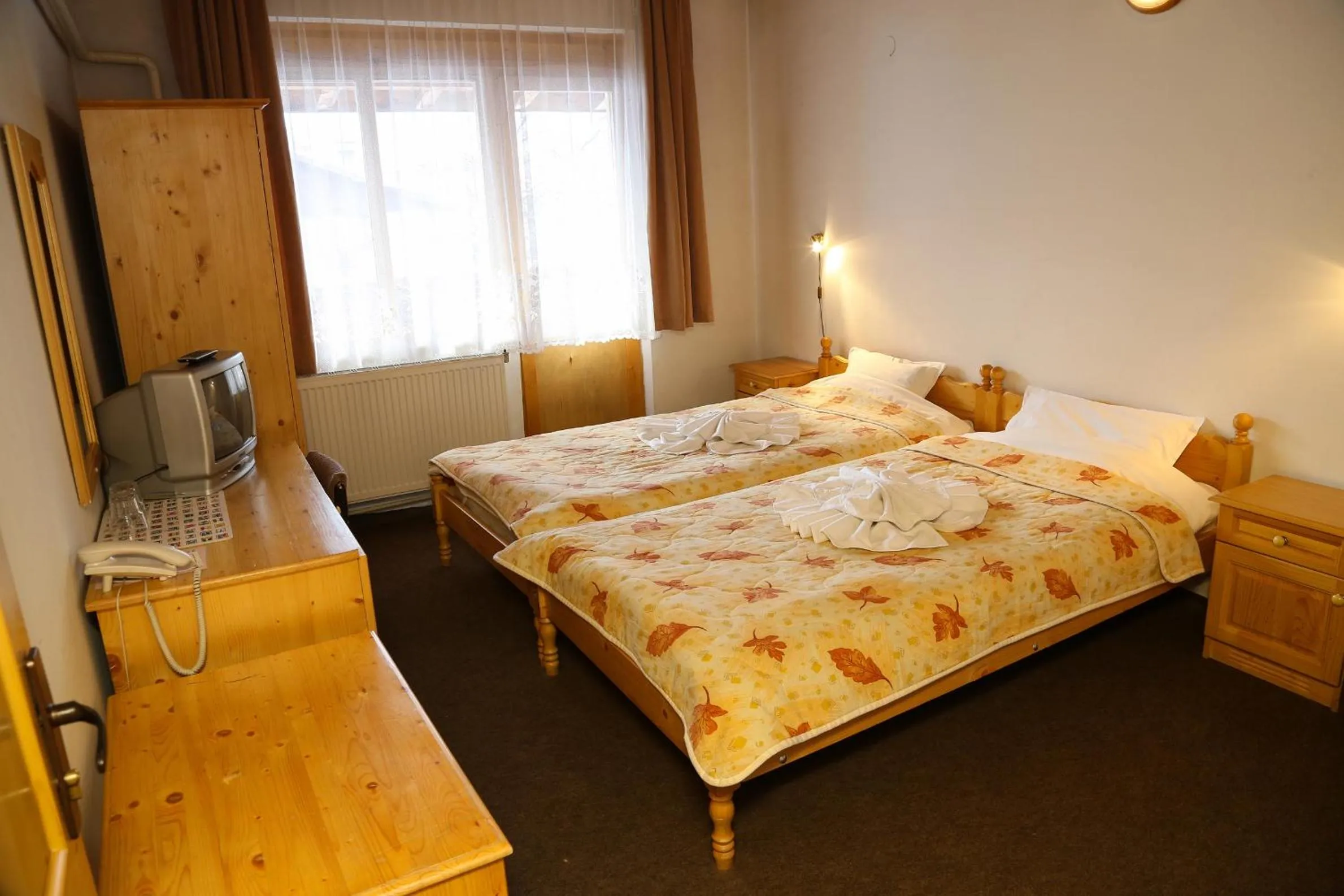 Bed in Family Hotel Bisser