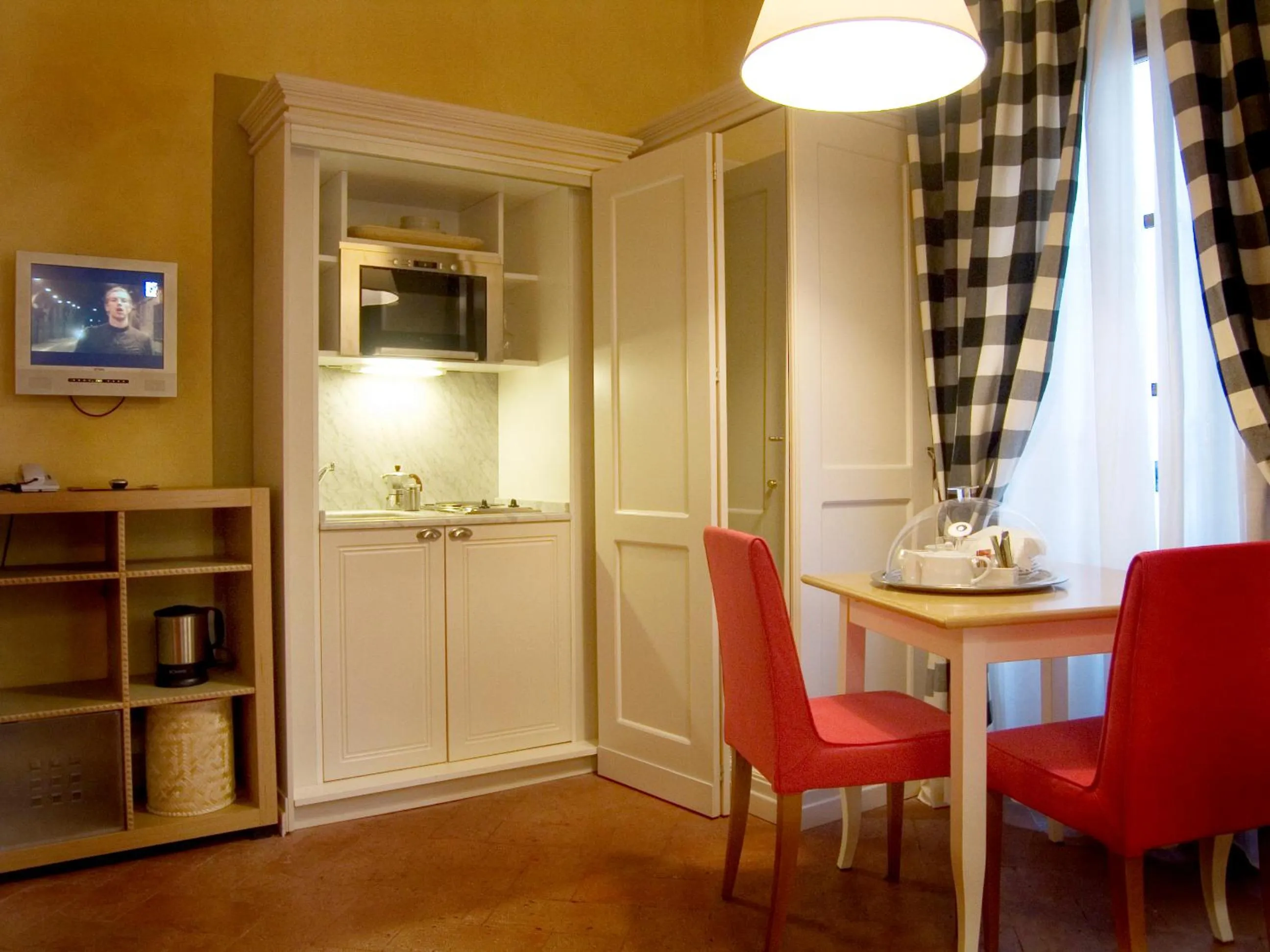 Kitchen or kitchenette in Piccolo Residence Apart-Hotel