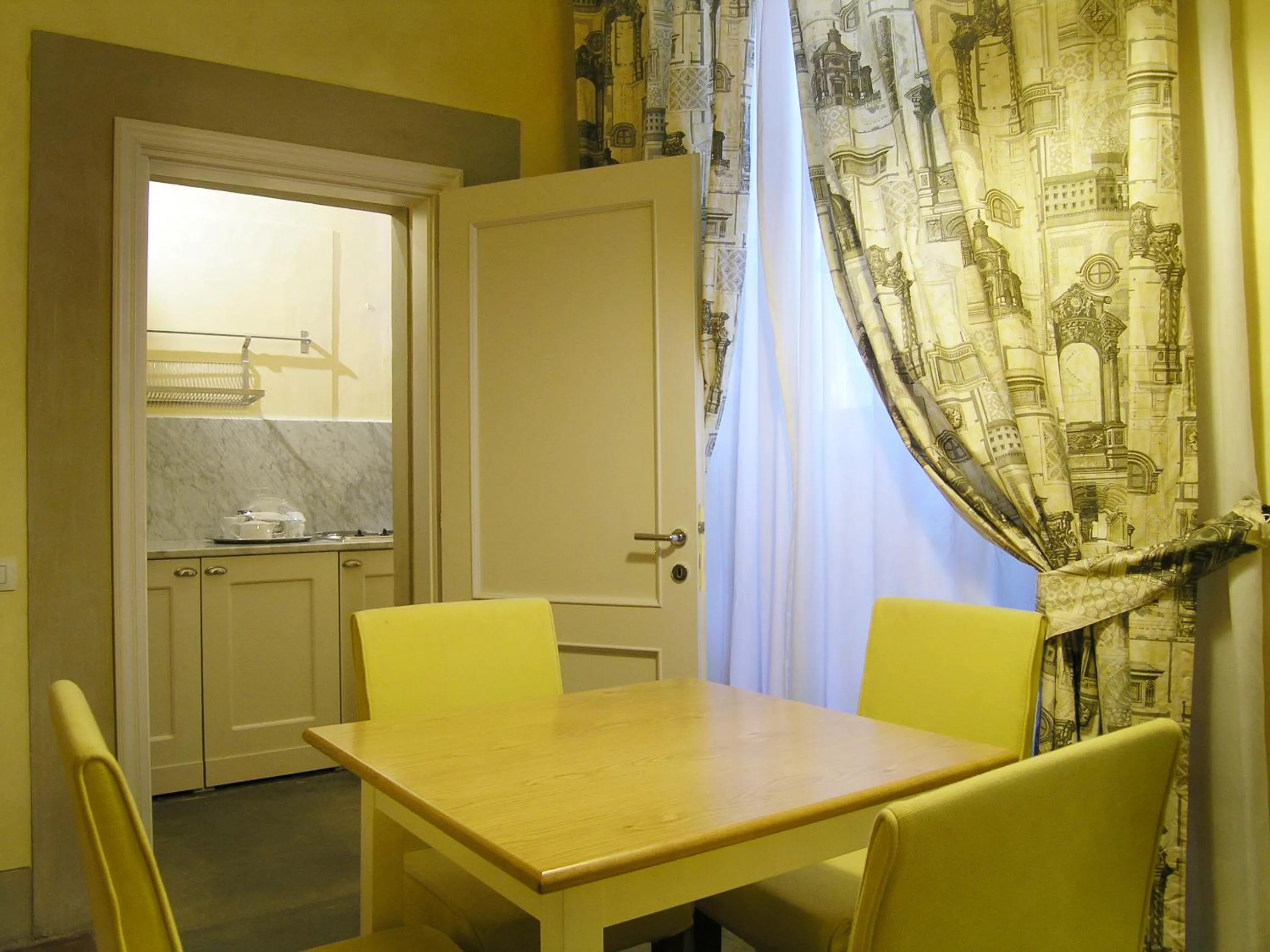Kitchen or kitchenette in Piccolo Residence Apart-Hotel