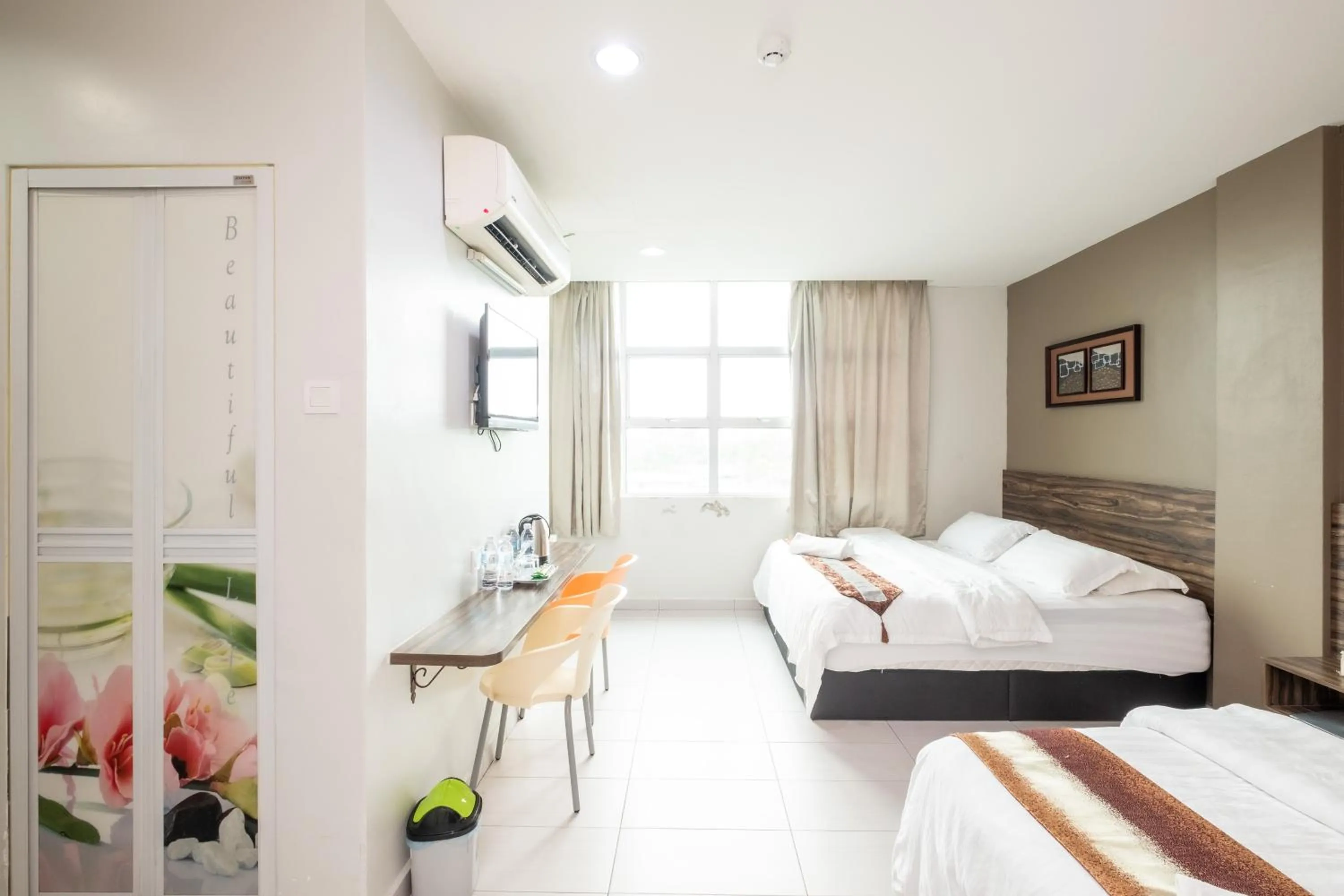 Bed in BG Business Hotel