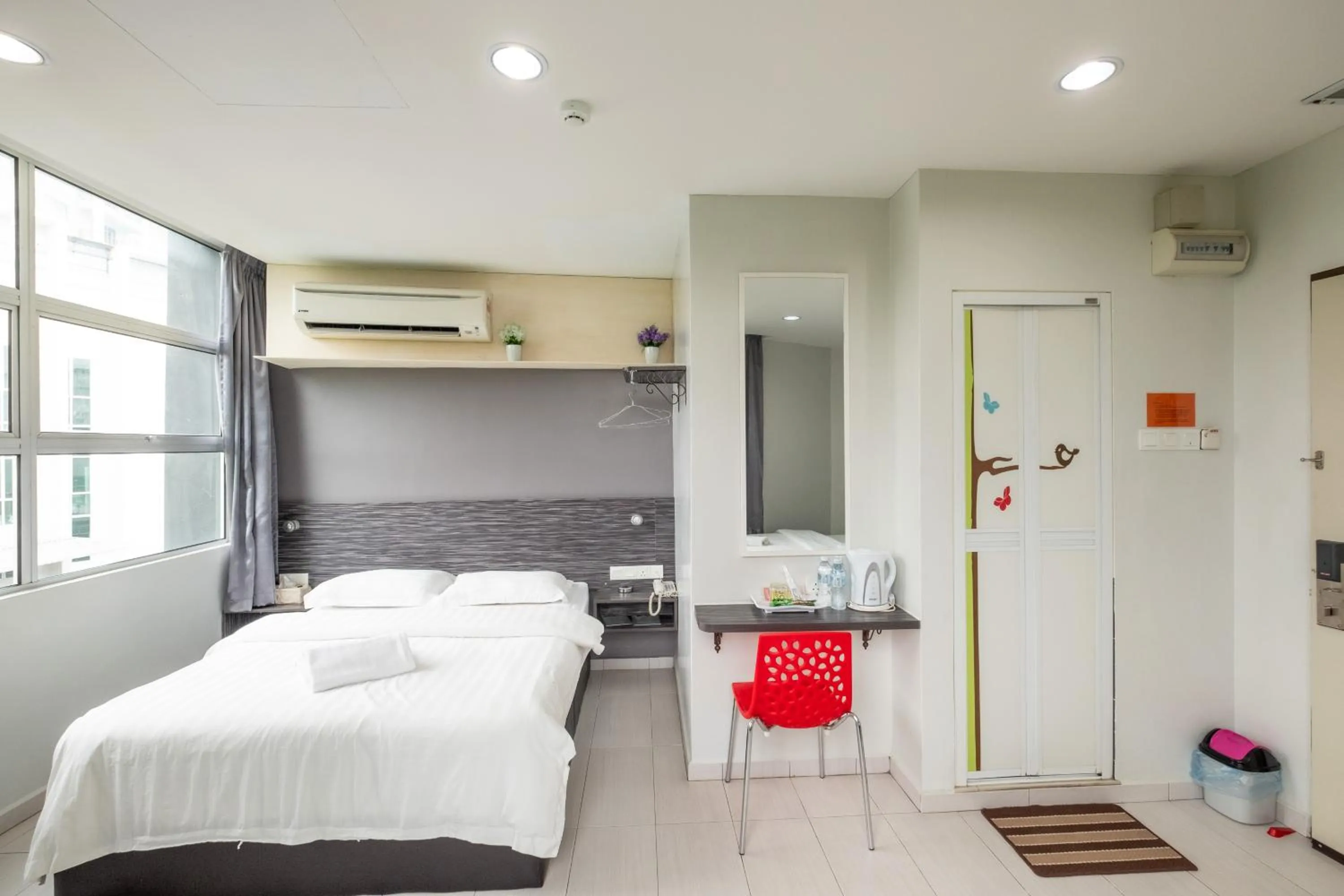 Bed in BG Business Hotel