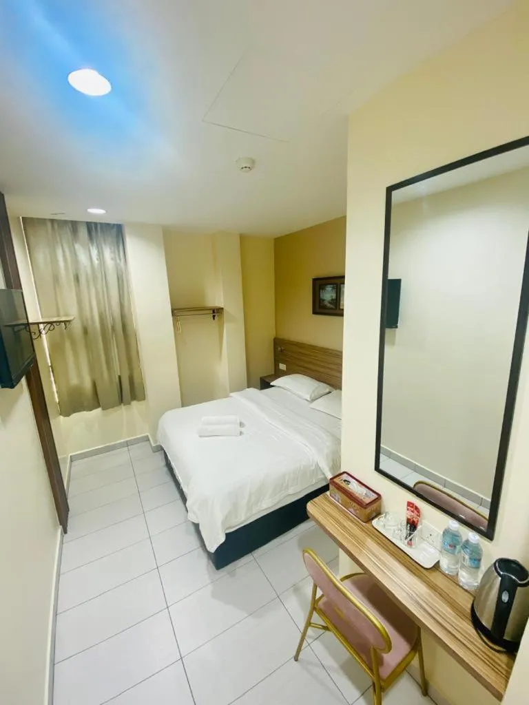 Bed in BG Business Hotel