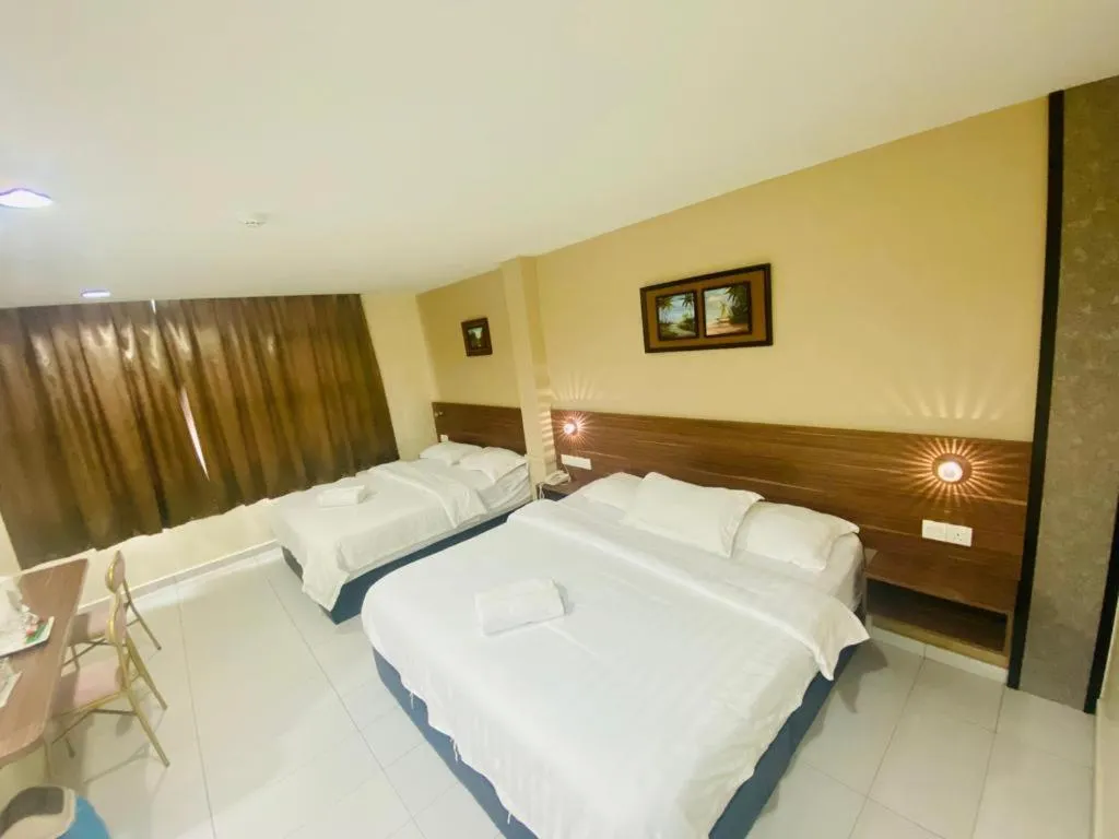 Bed in BG Business Hotel