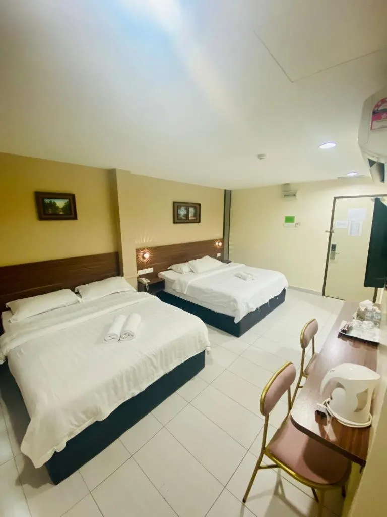 Bed in BG Business Hotel