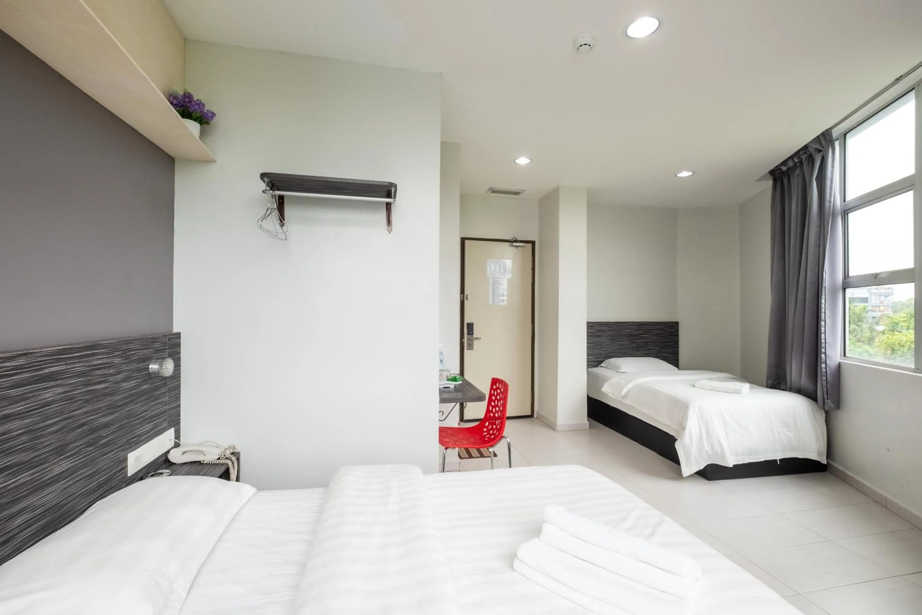 Bed in BG Business Hotel