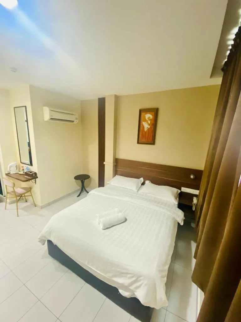 Bed in BG Business Hotel