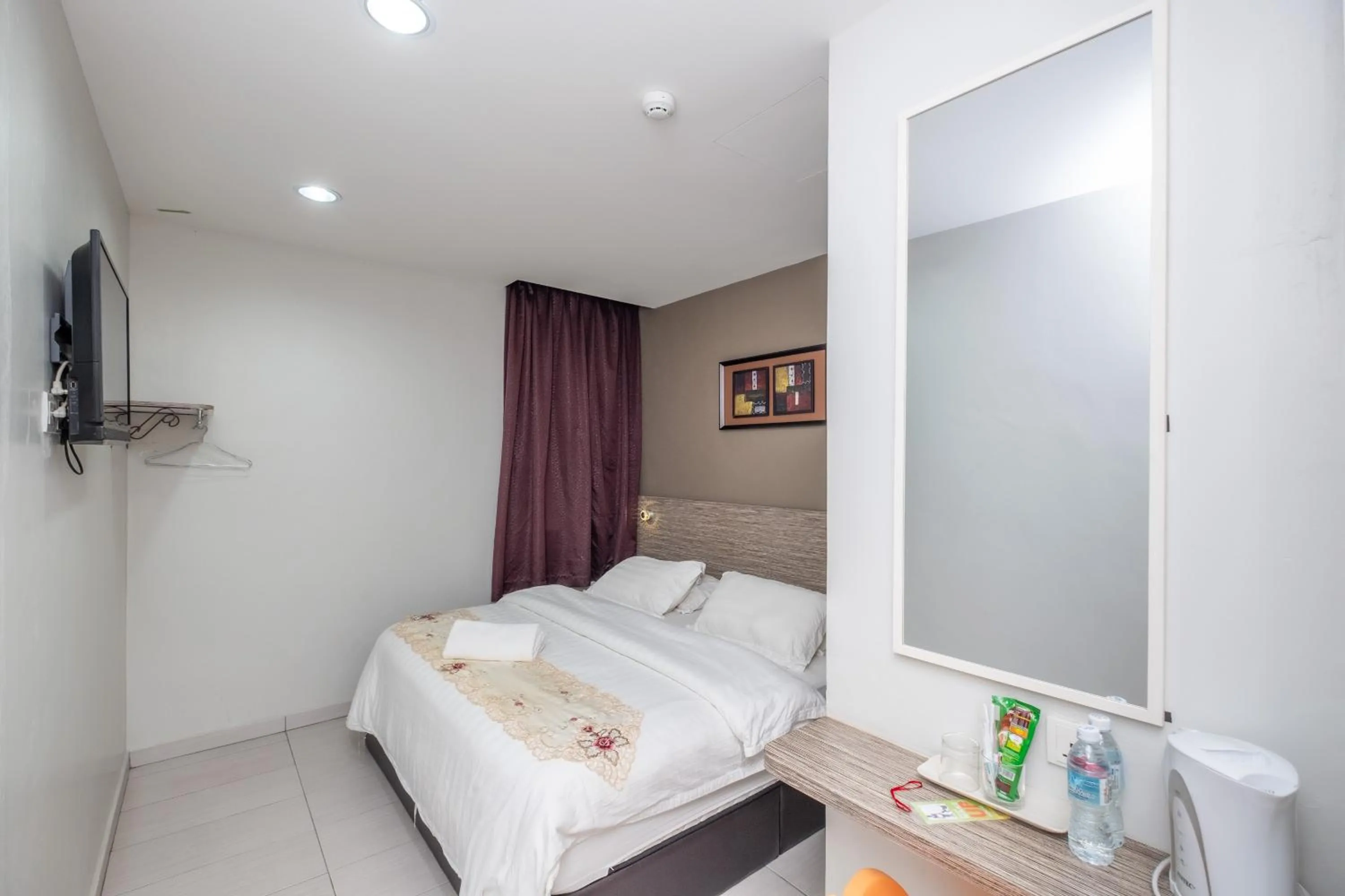 Bed in BG Business Hotel