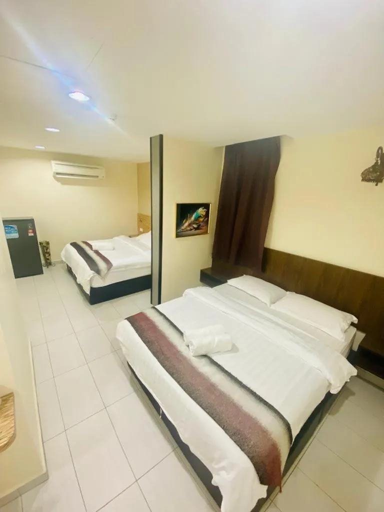 Bed in BG Business Hotel