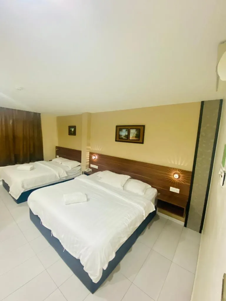 Bed in BG Business Hotel