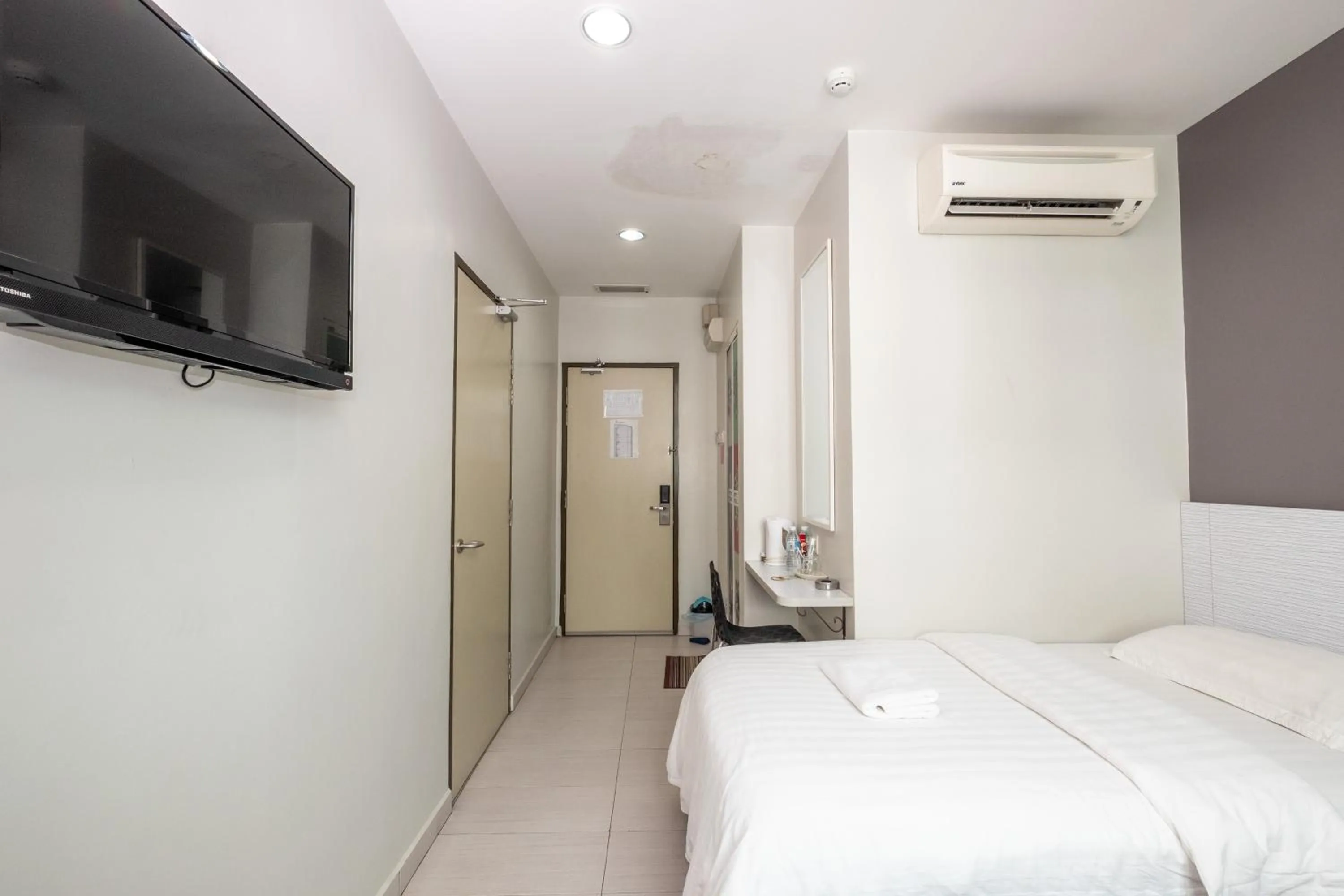 Bed in BG Business Hotel