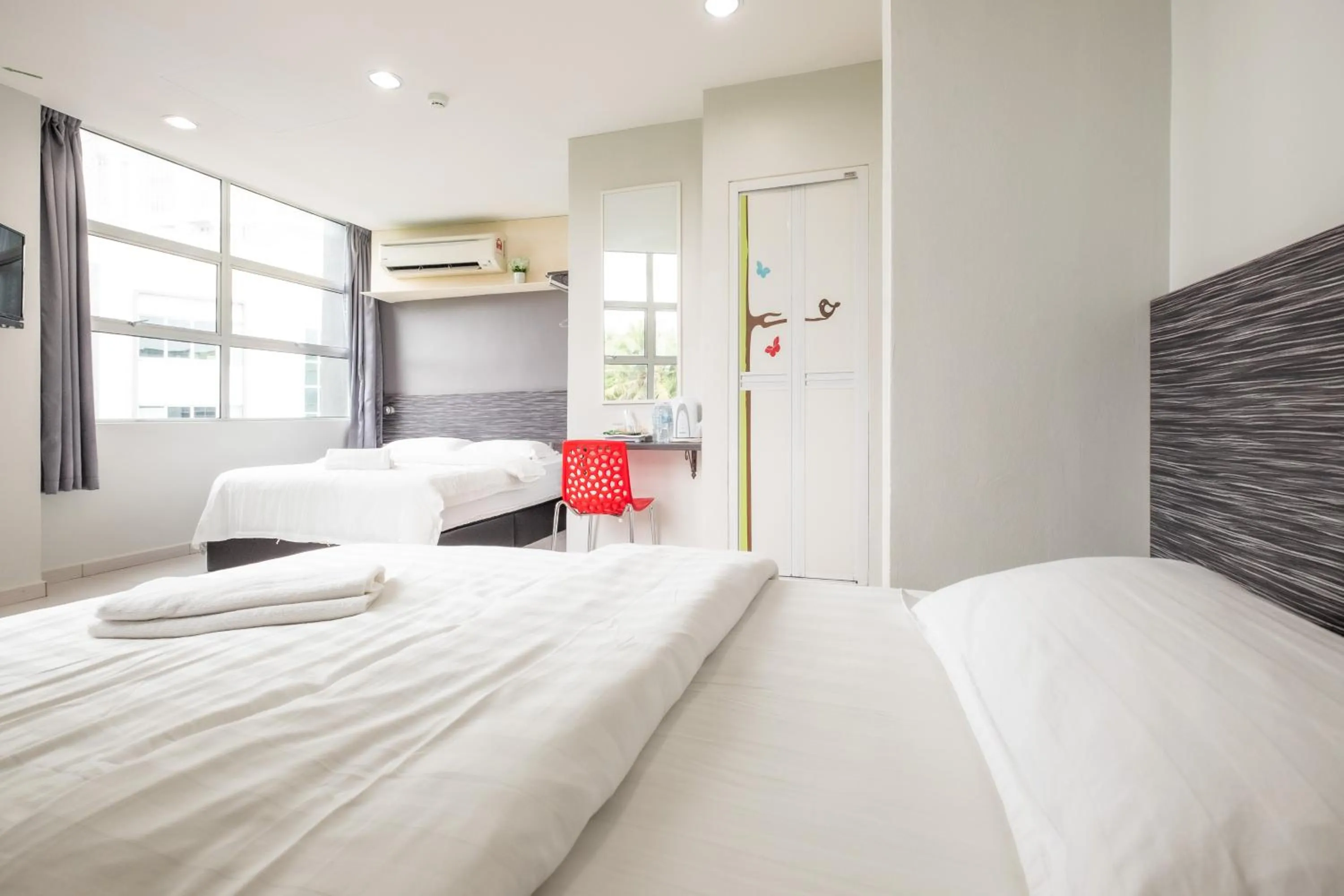 Bed in BG Business Hotel