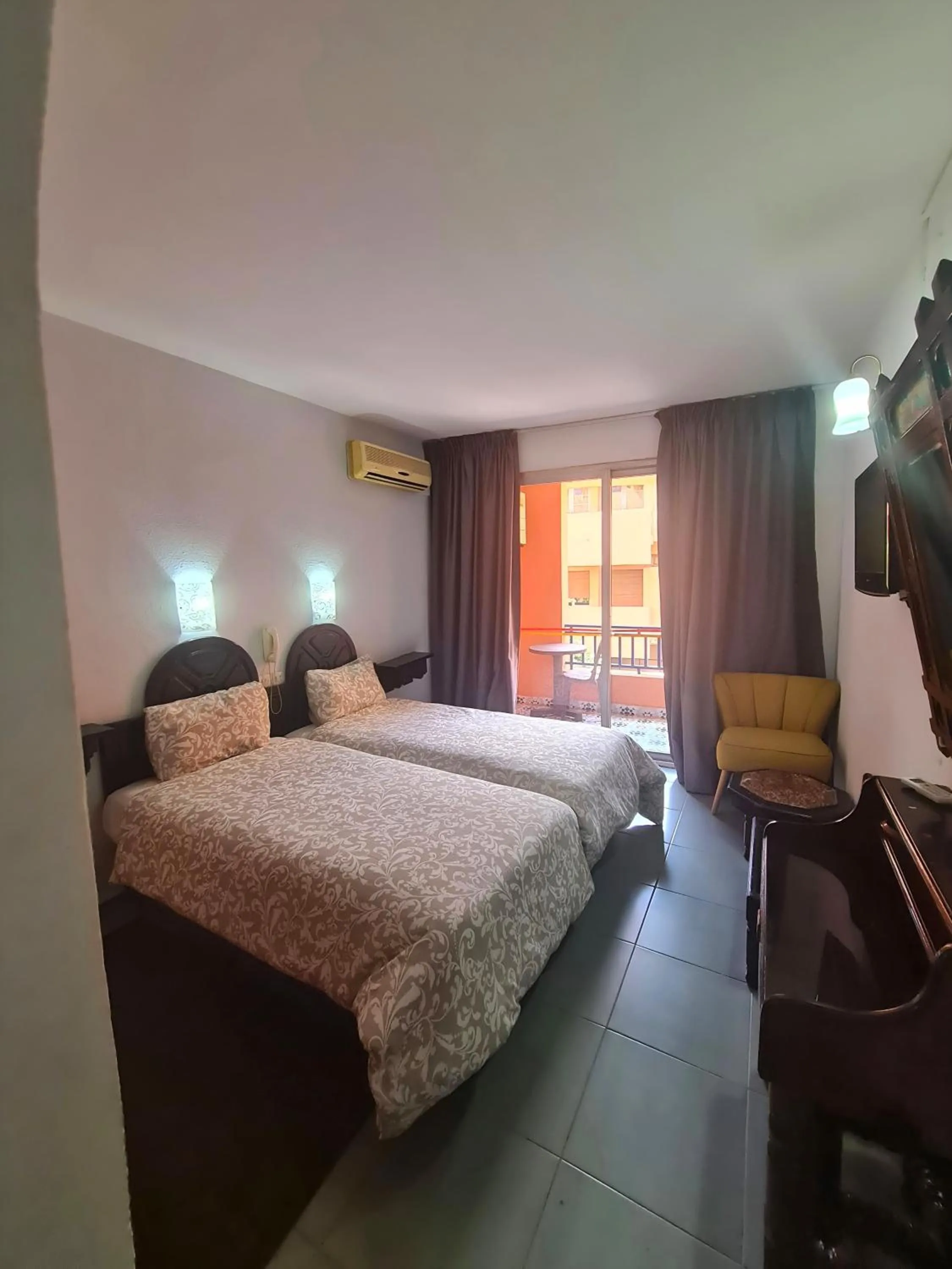 Bed in Hotel Tachfine