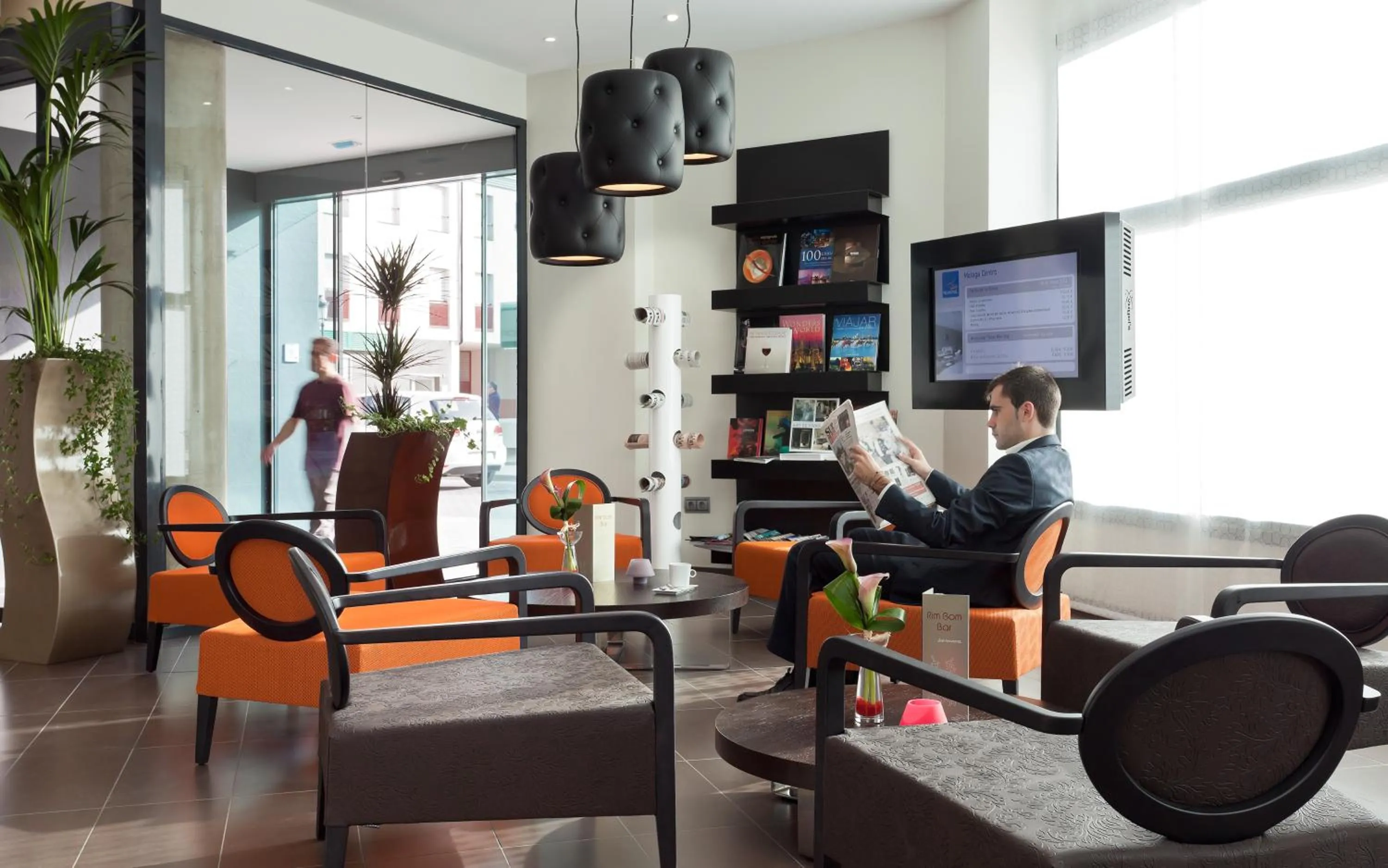 Lobby or reception in Novotel Suites Malaga Centro