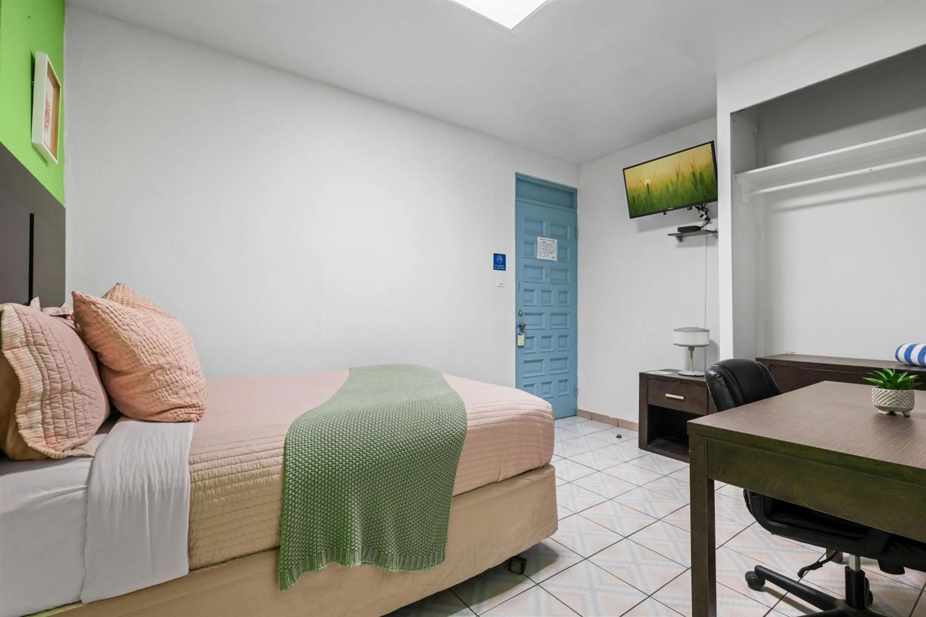 Bed in Borinquen Beach Inn