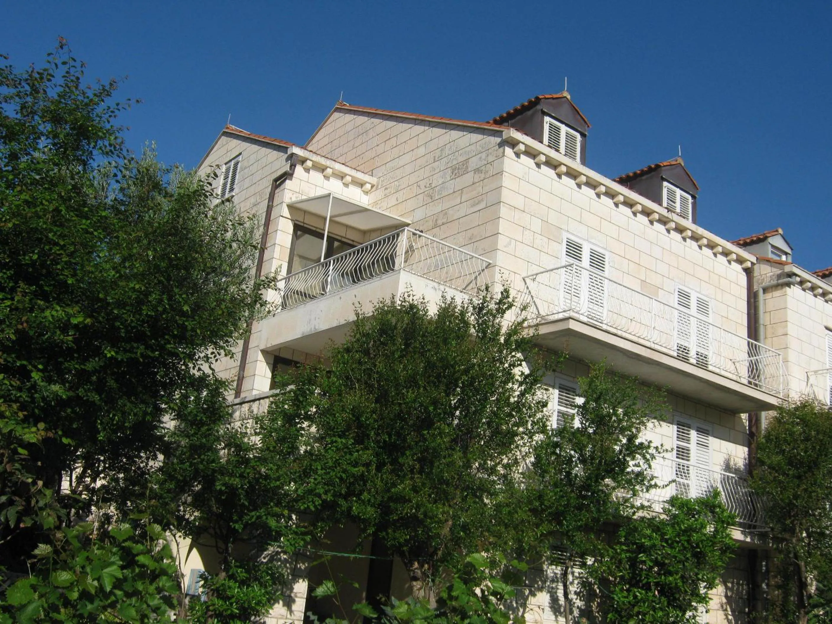 Property building in Apartments and Rooms Artemida
