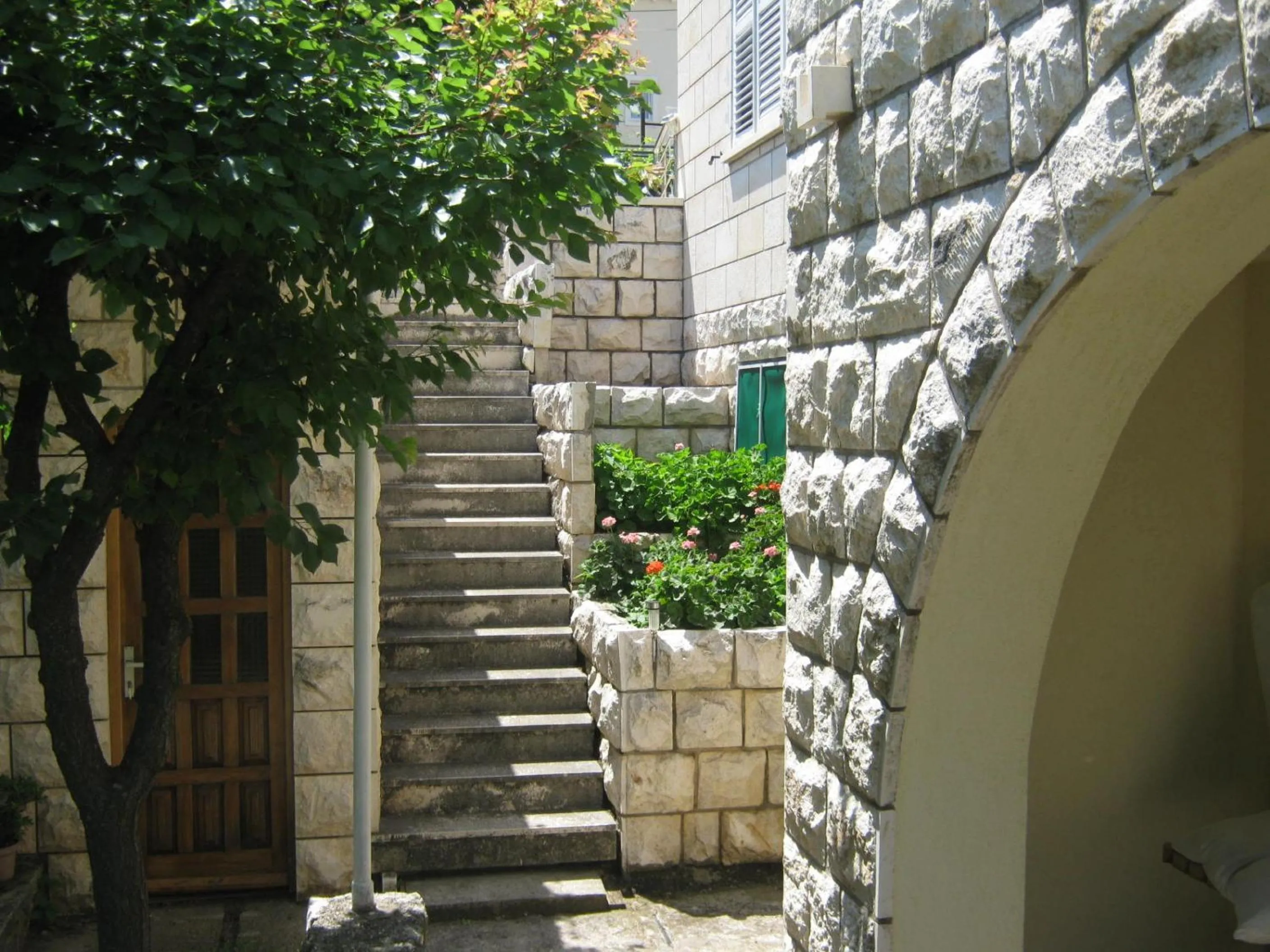 Property building in Apartments and Rooms Artemida