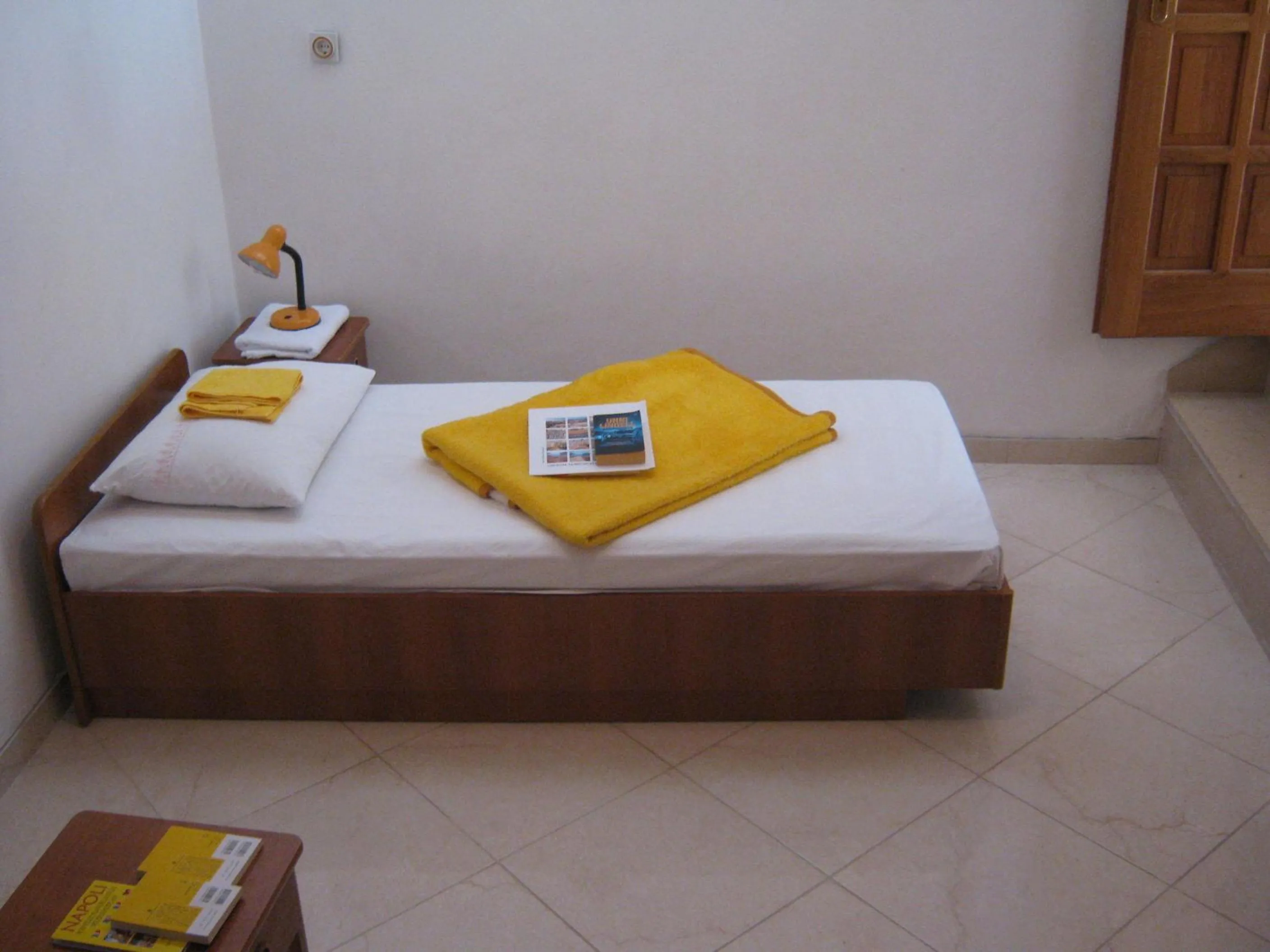 Bed in Apartments and Rooms Artemida