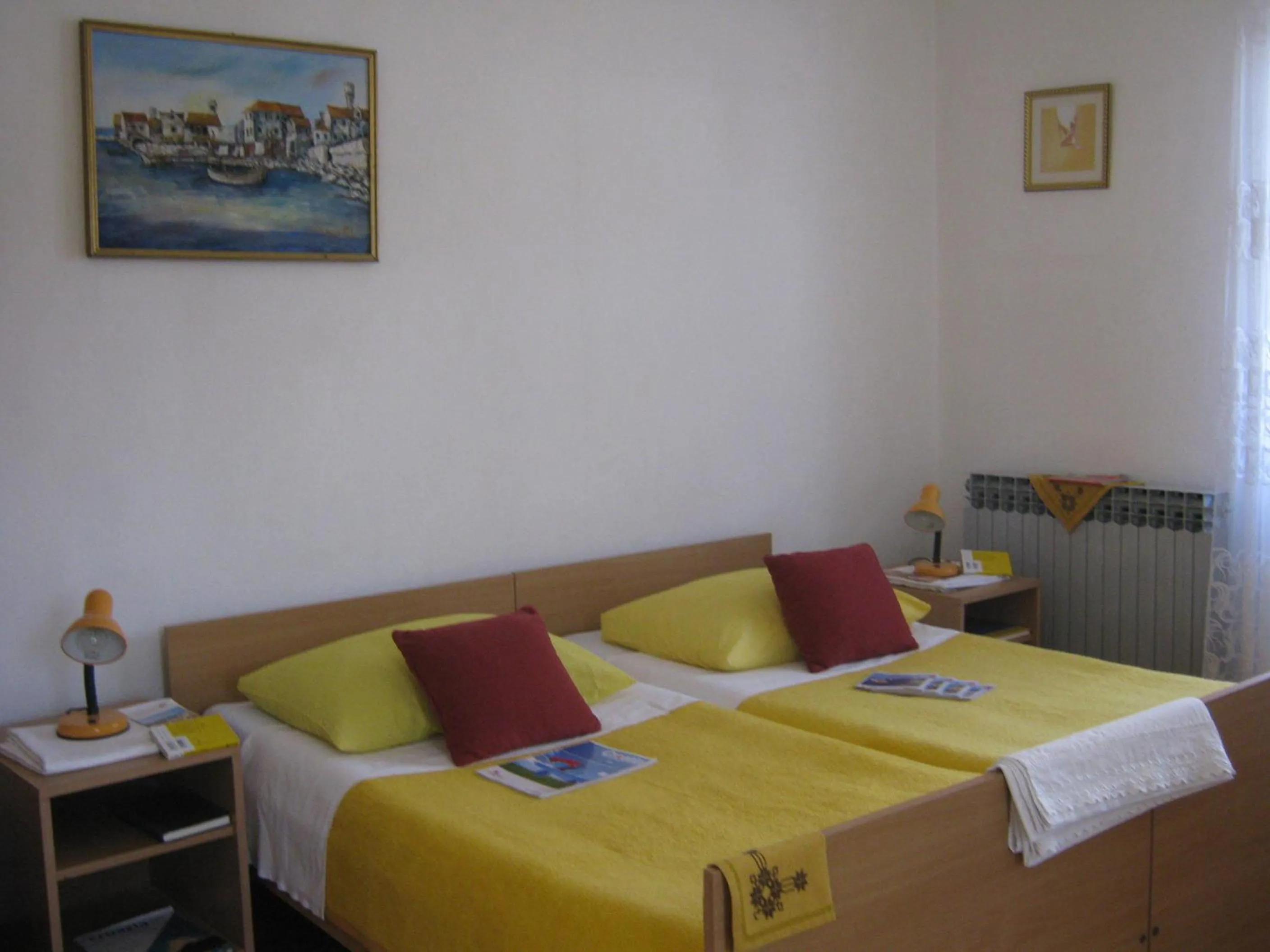 Bed in Apartments and Rooms Artemida