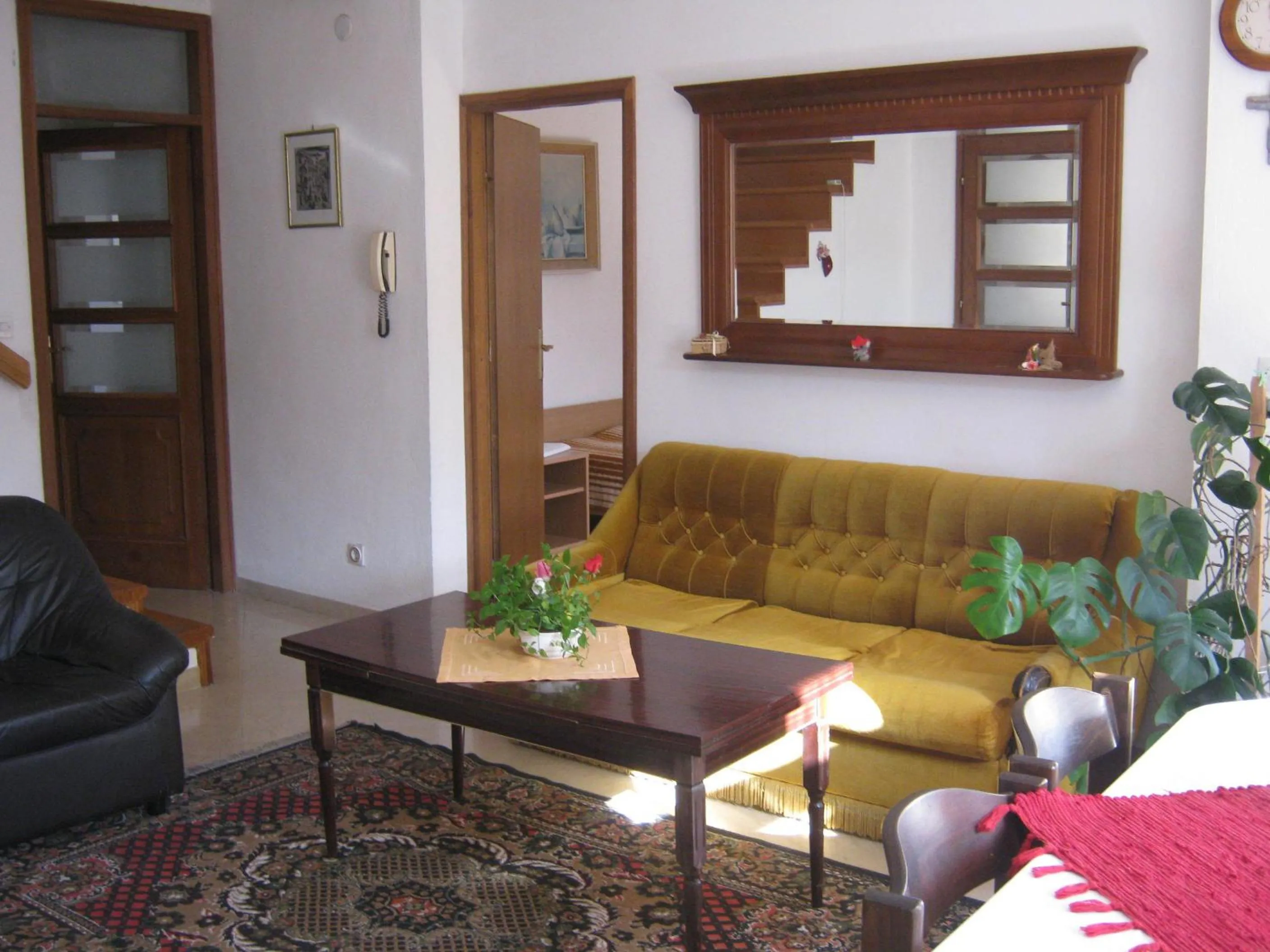 Seating area in Apartments and Rooms Artemida