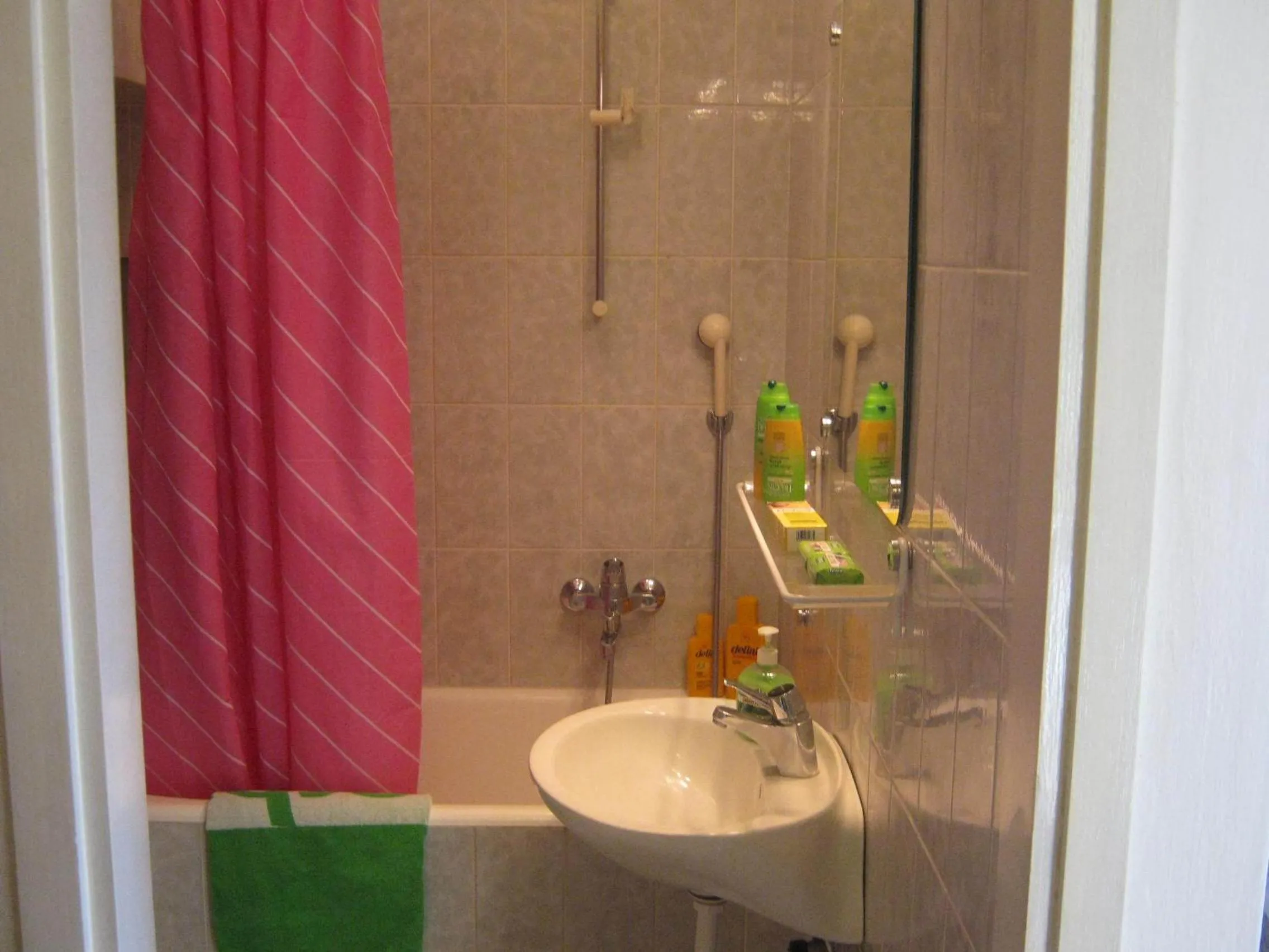 Bathroom in Apartments and Rooms Artemida