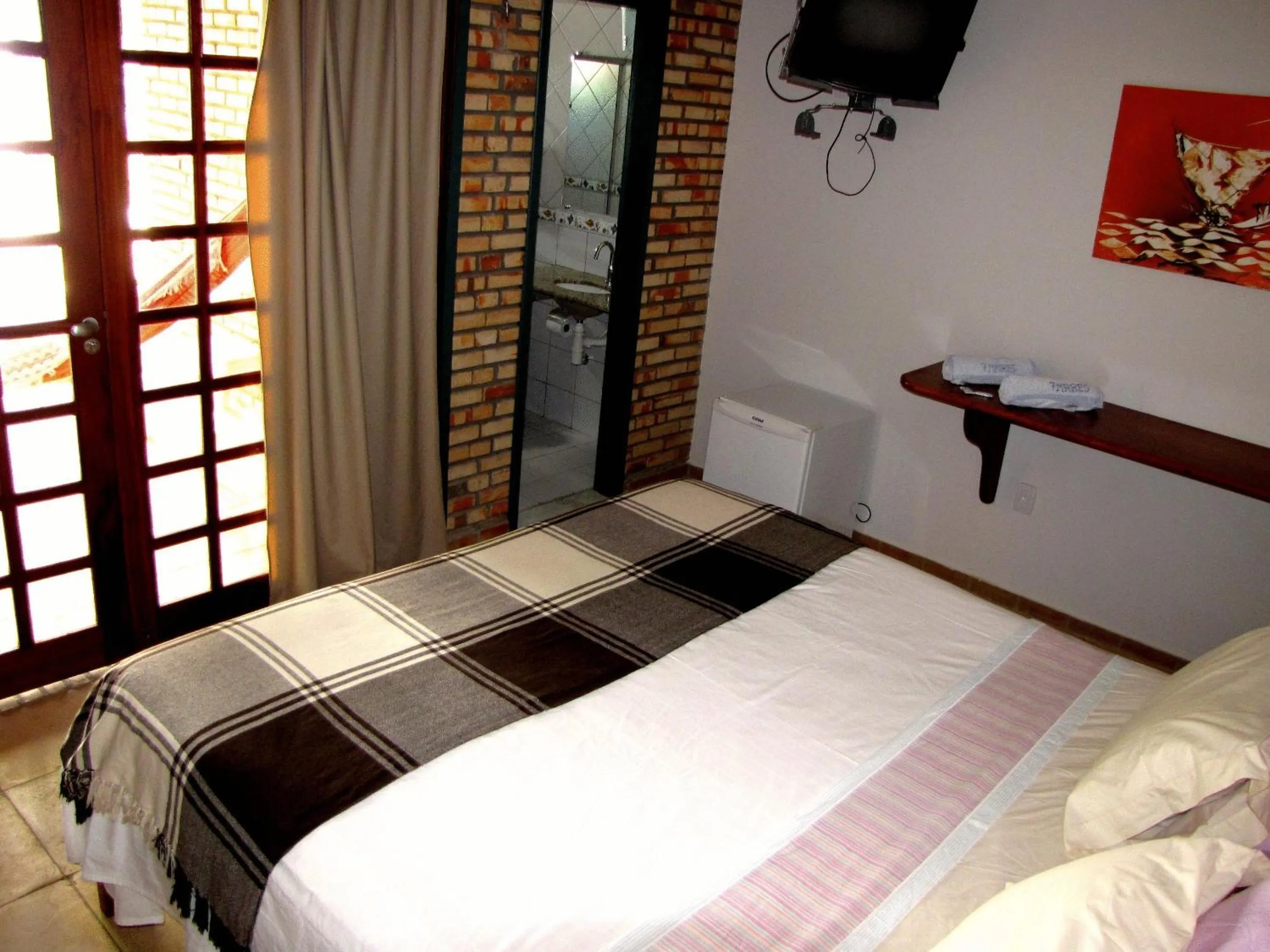 Photo of the whole room, Bed in Pousada 7 Mares
