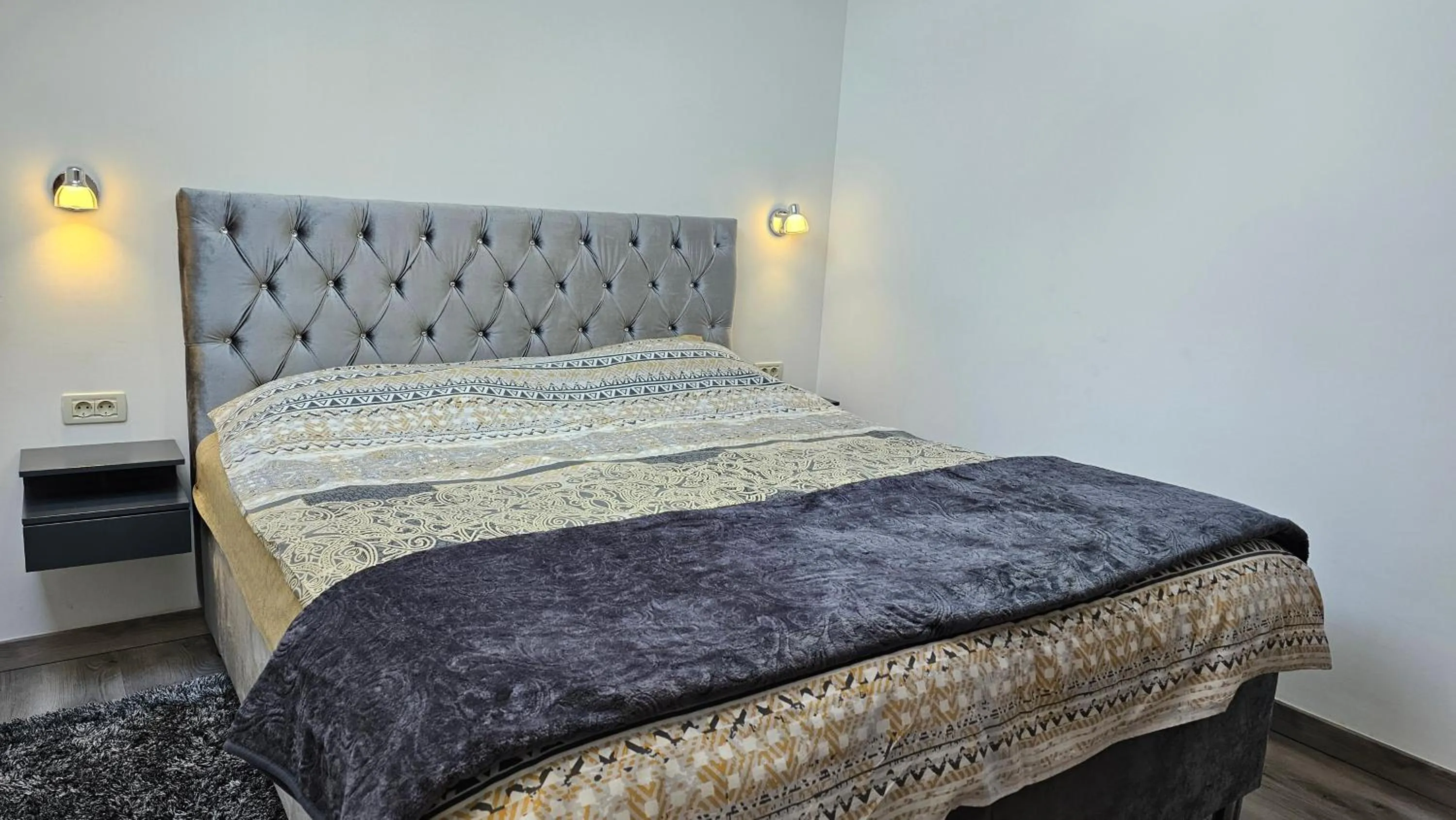 Bed in Adria Apartments and Rooms