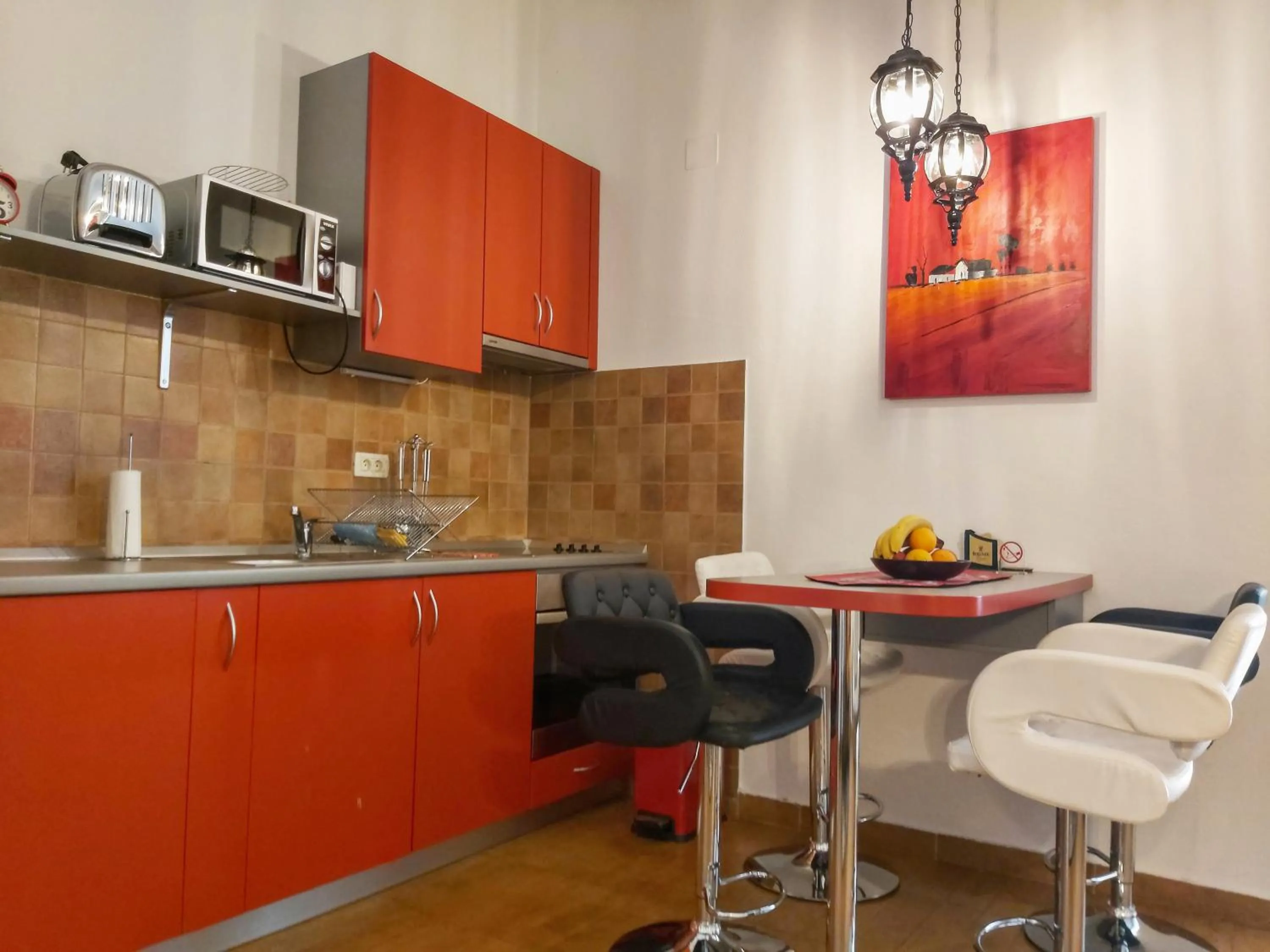 Kitchen or kitchenette in Adria Apartments and Rooms