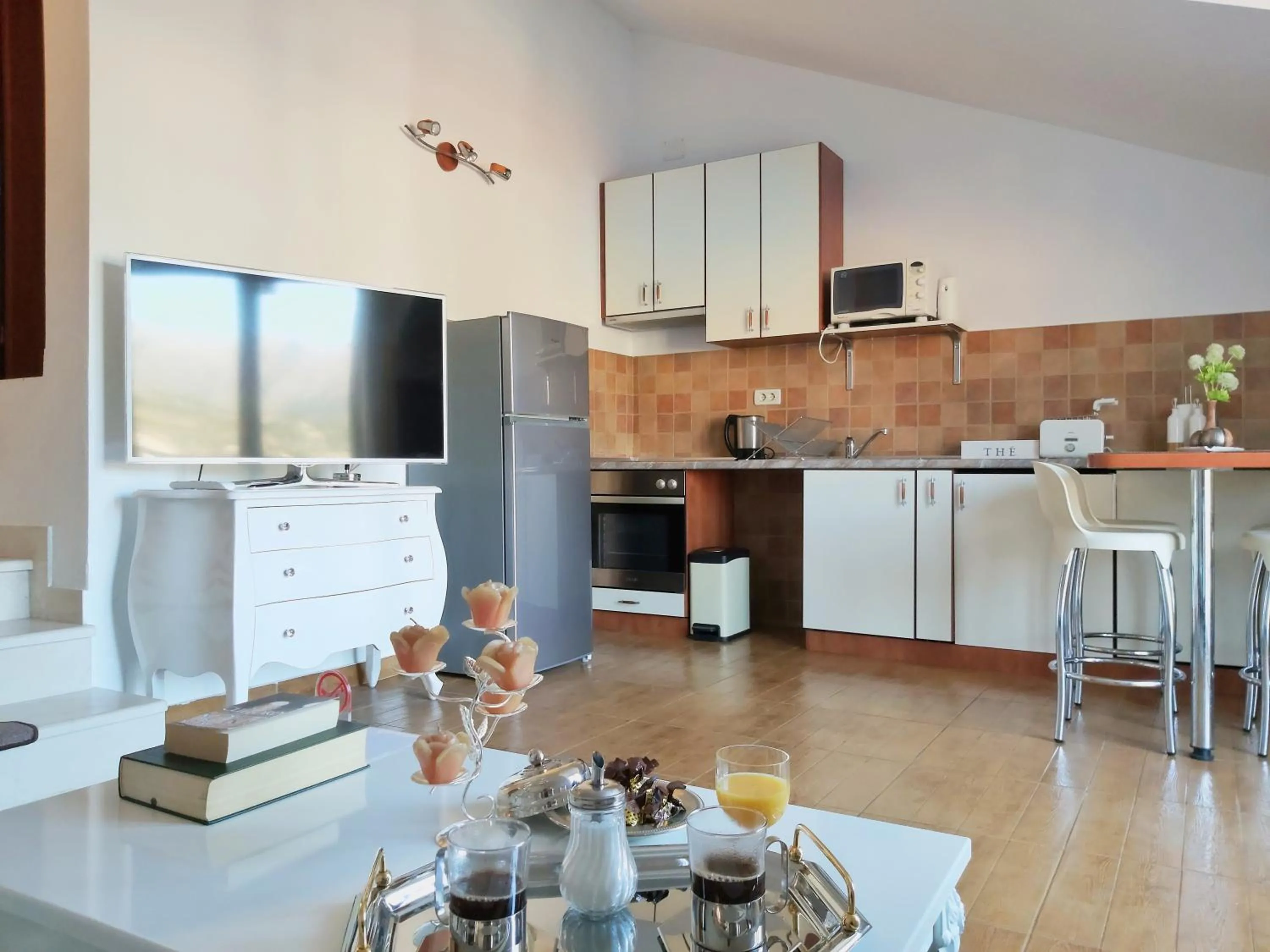 Kitchen or kitchenette in Adria Apartments and Rooms