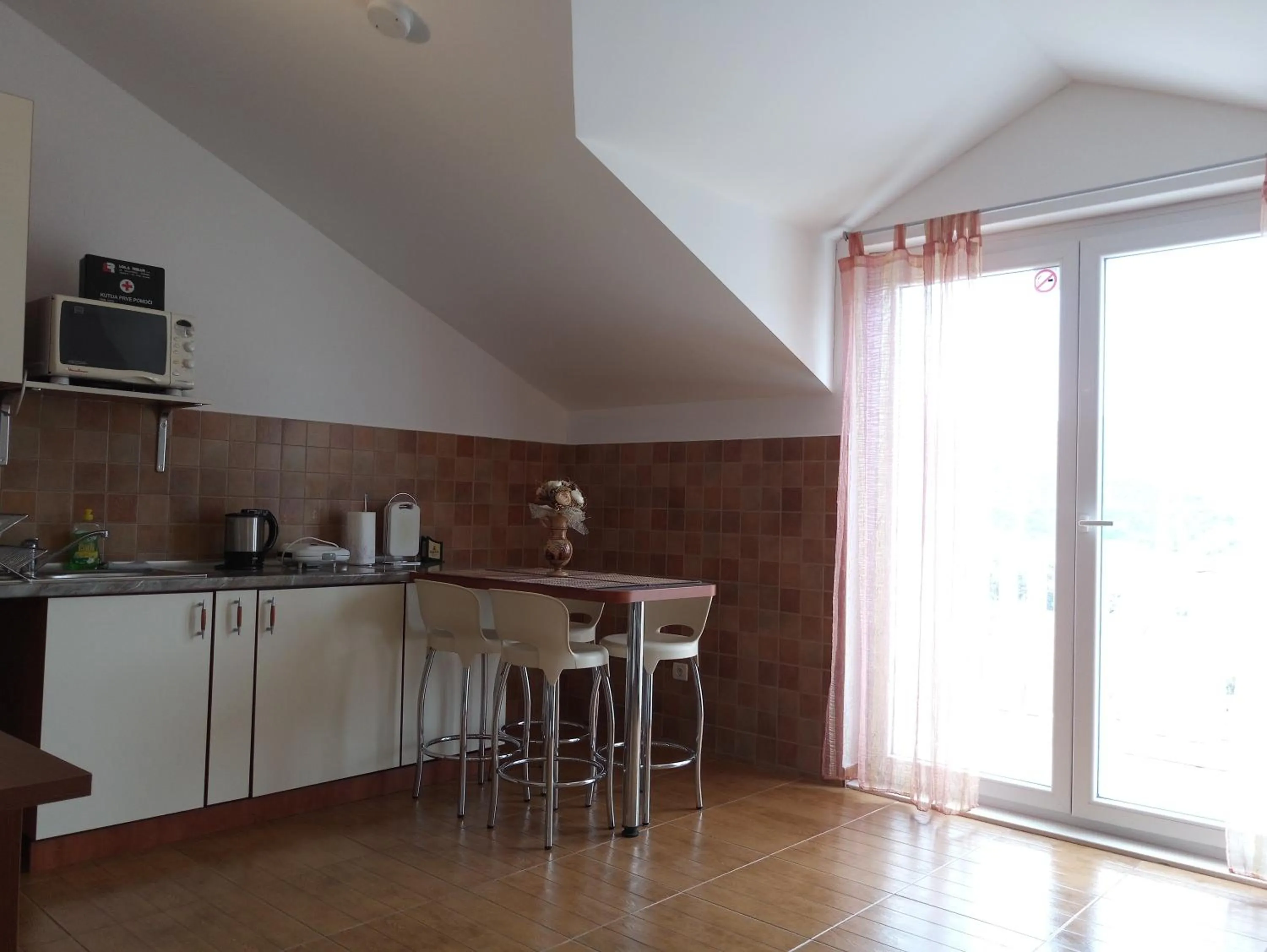 Kitchen or kitchenette in Adria Apartments and Rooms