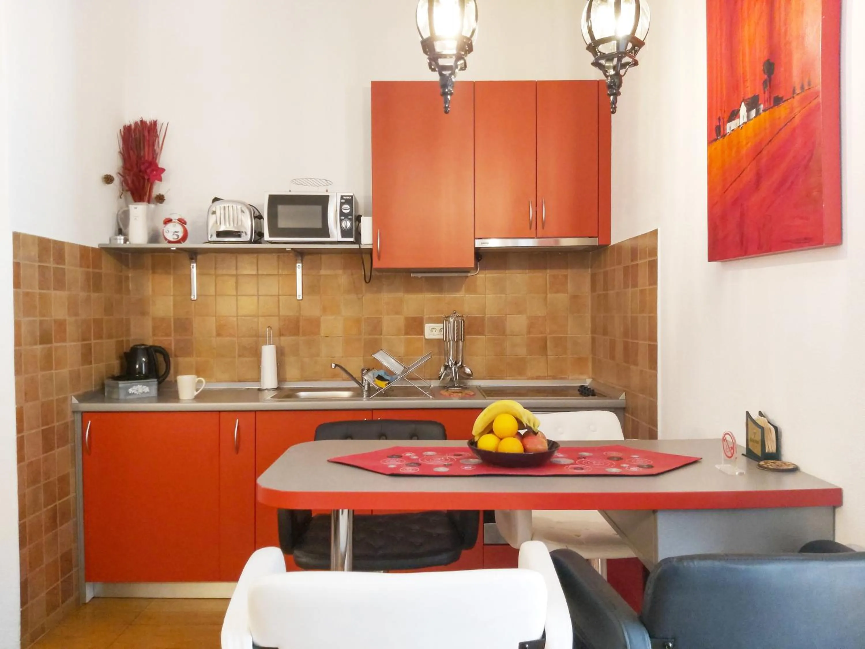 Kitchen or kitchenette in Adria Apartments and Rooms