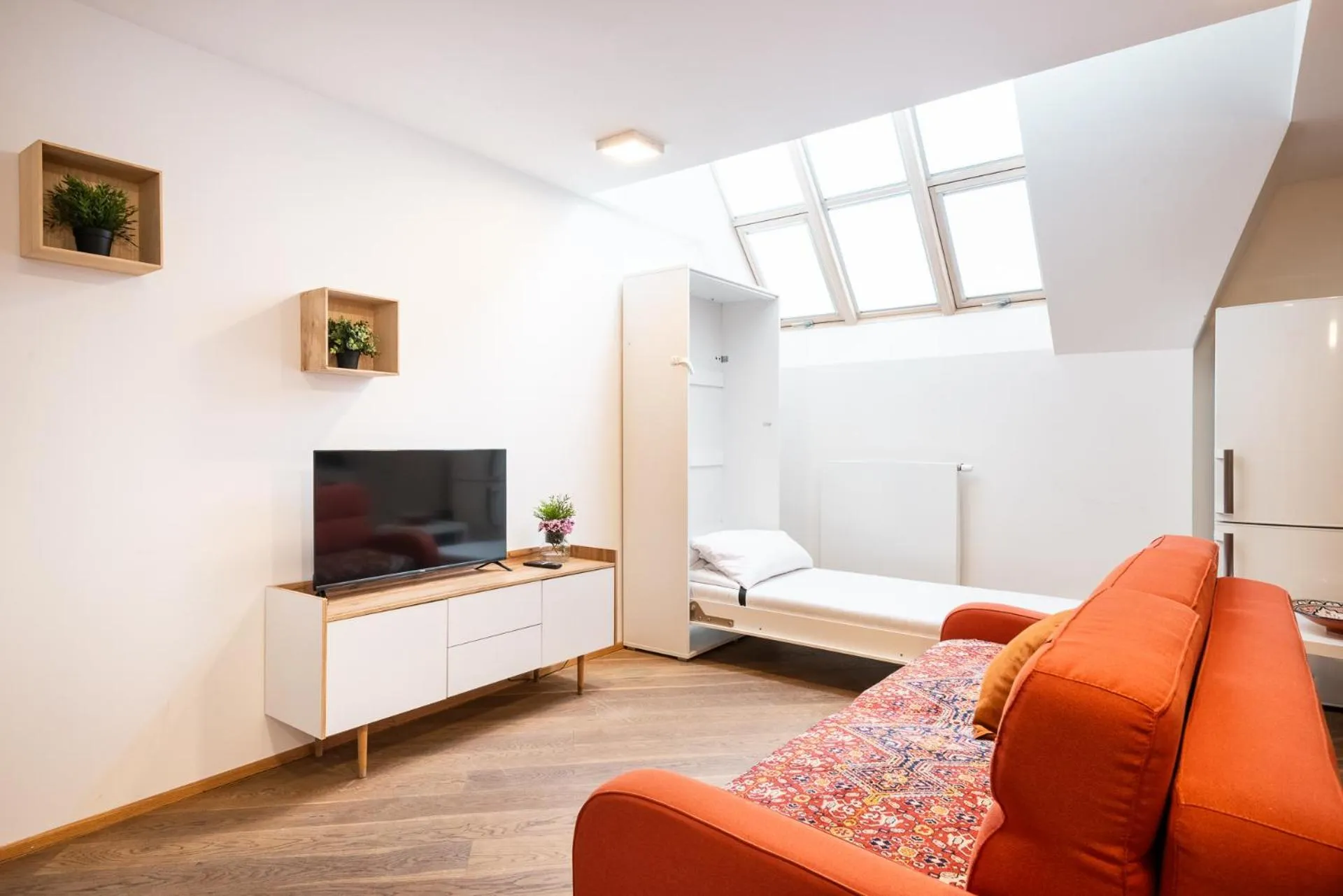 Bed in Rehorova apartments by Pragueforyou