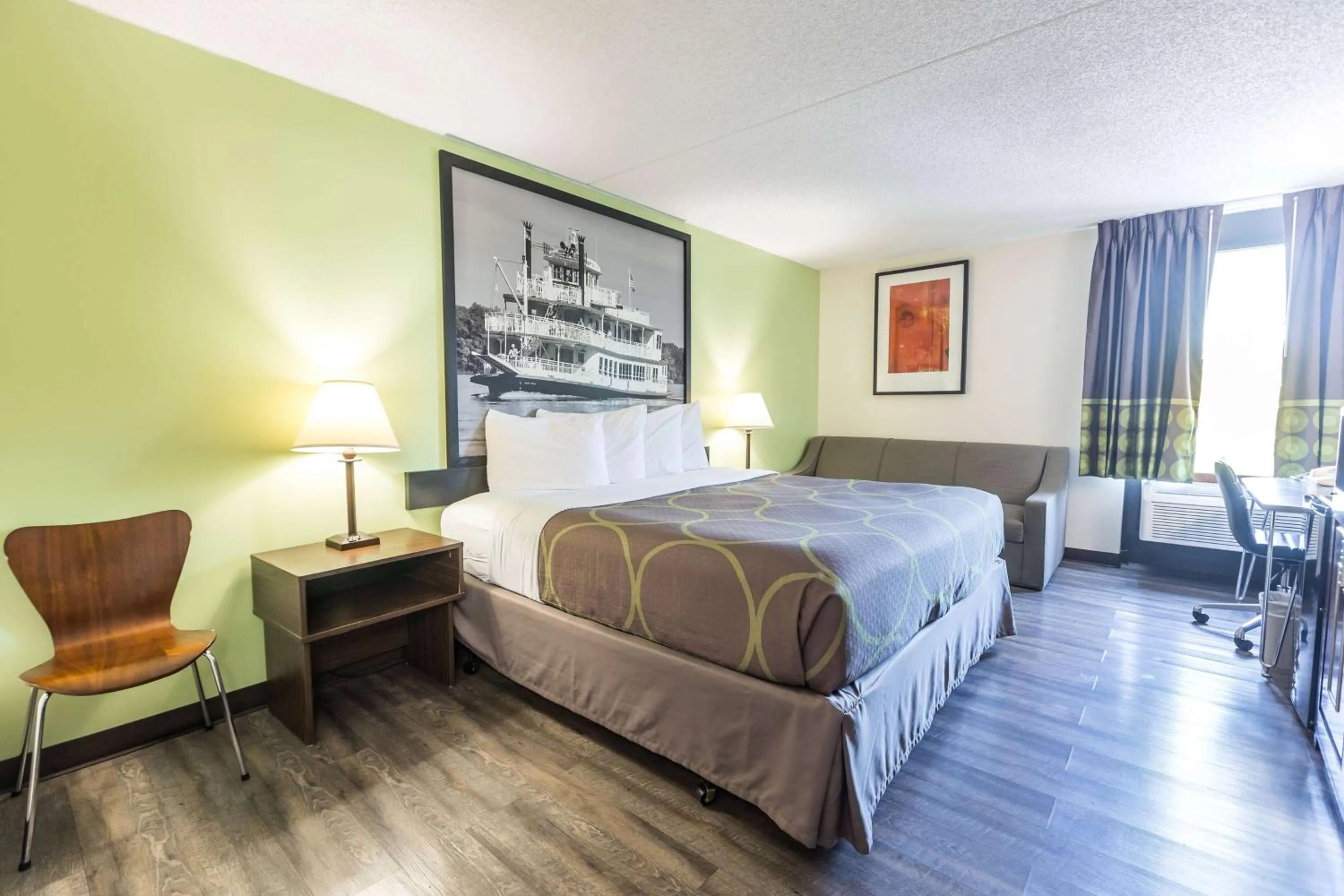 Photo of the whole room, Bed in Super 8 by Wyndham Branson By Andy Williams Theatre