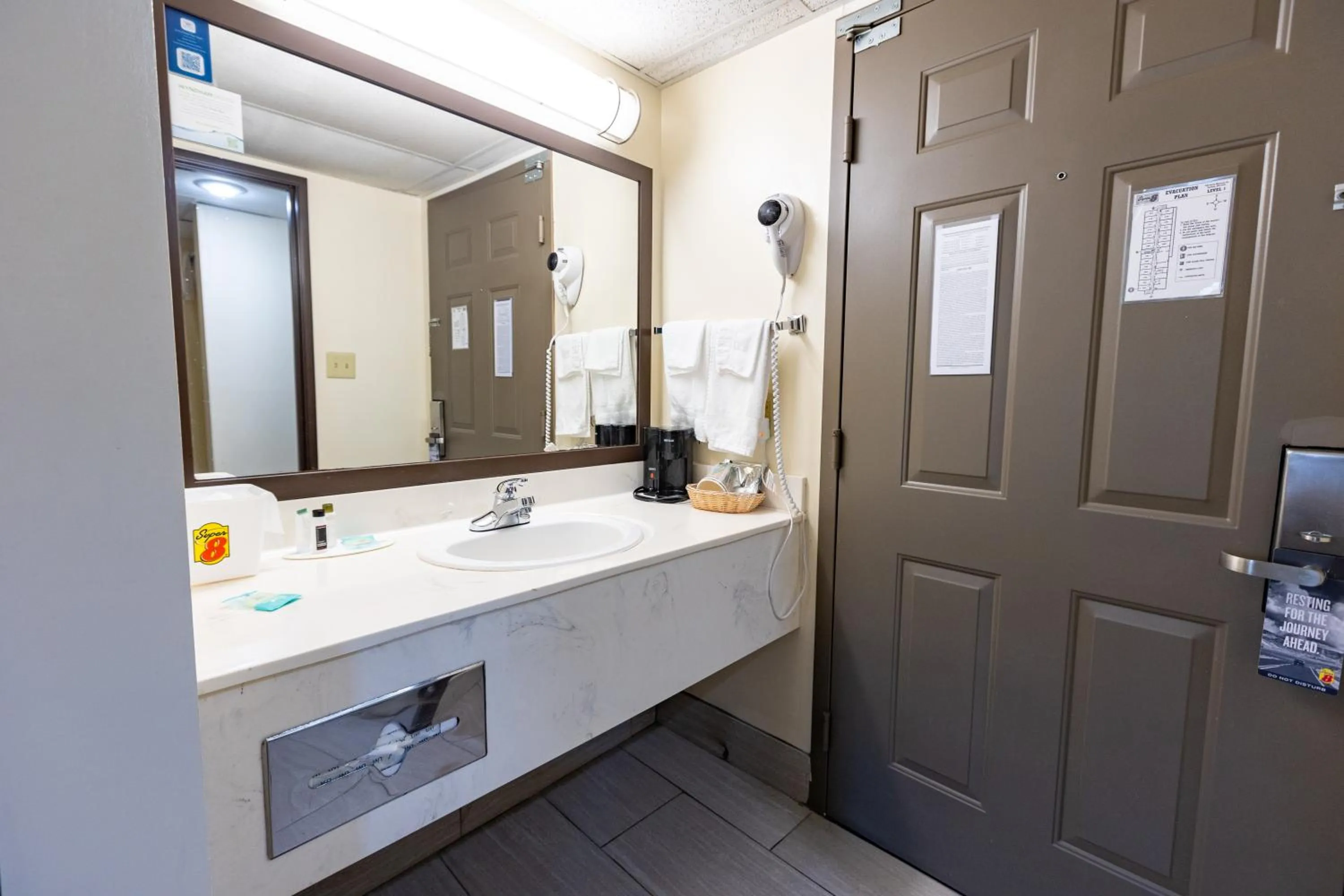 Bathroom in Super 8 by Wyndham Branson By Andy Williams Theatre