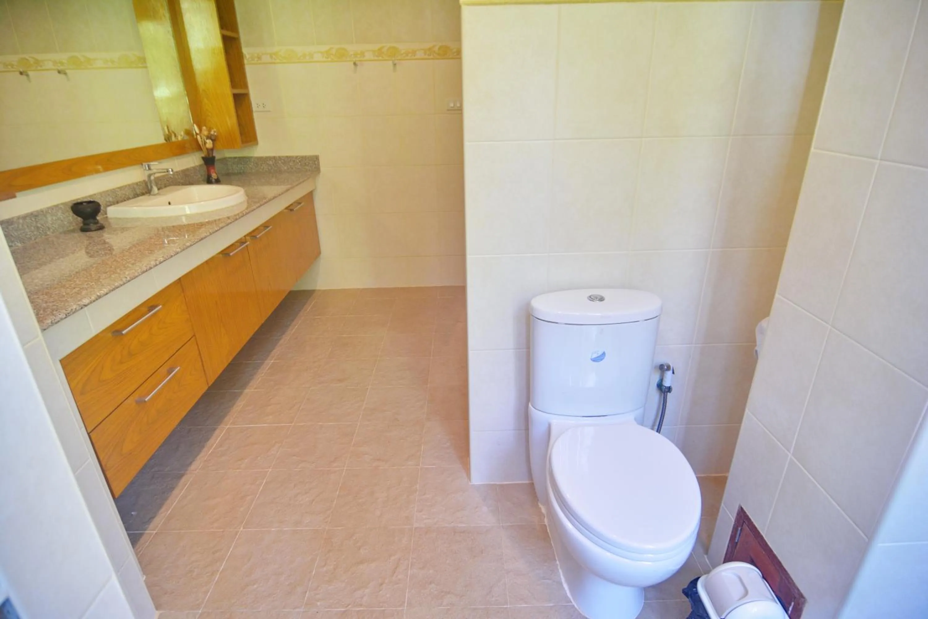 Toilet in White Flower Lanta