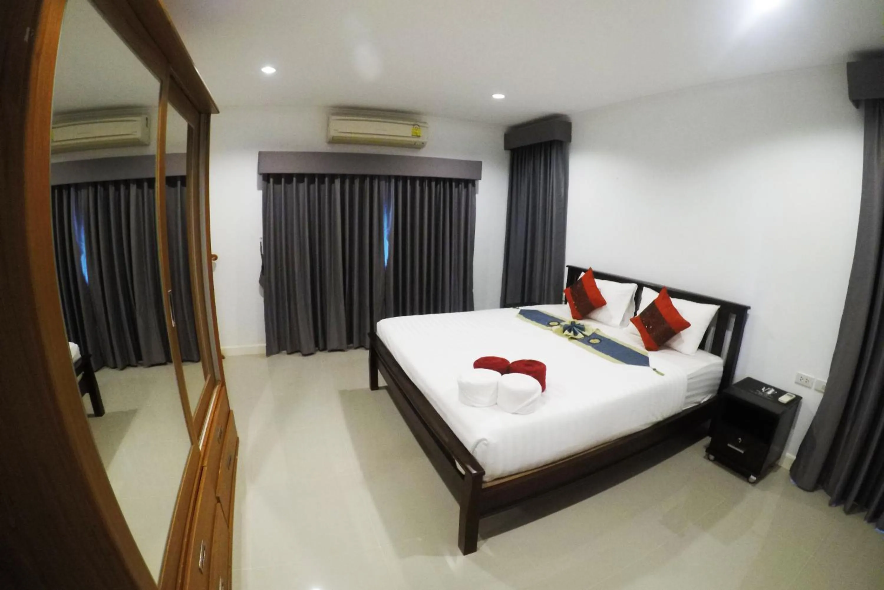 Photo of the whole room, Bed in White Flower Lanta