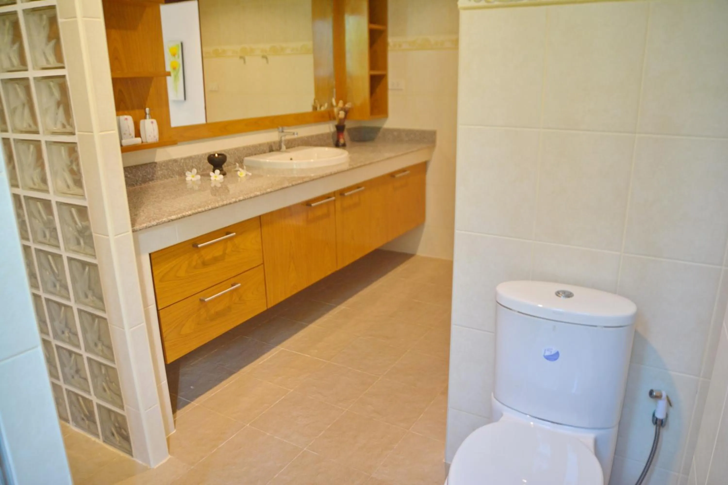 Toilet in White Flower Lanta